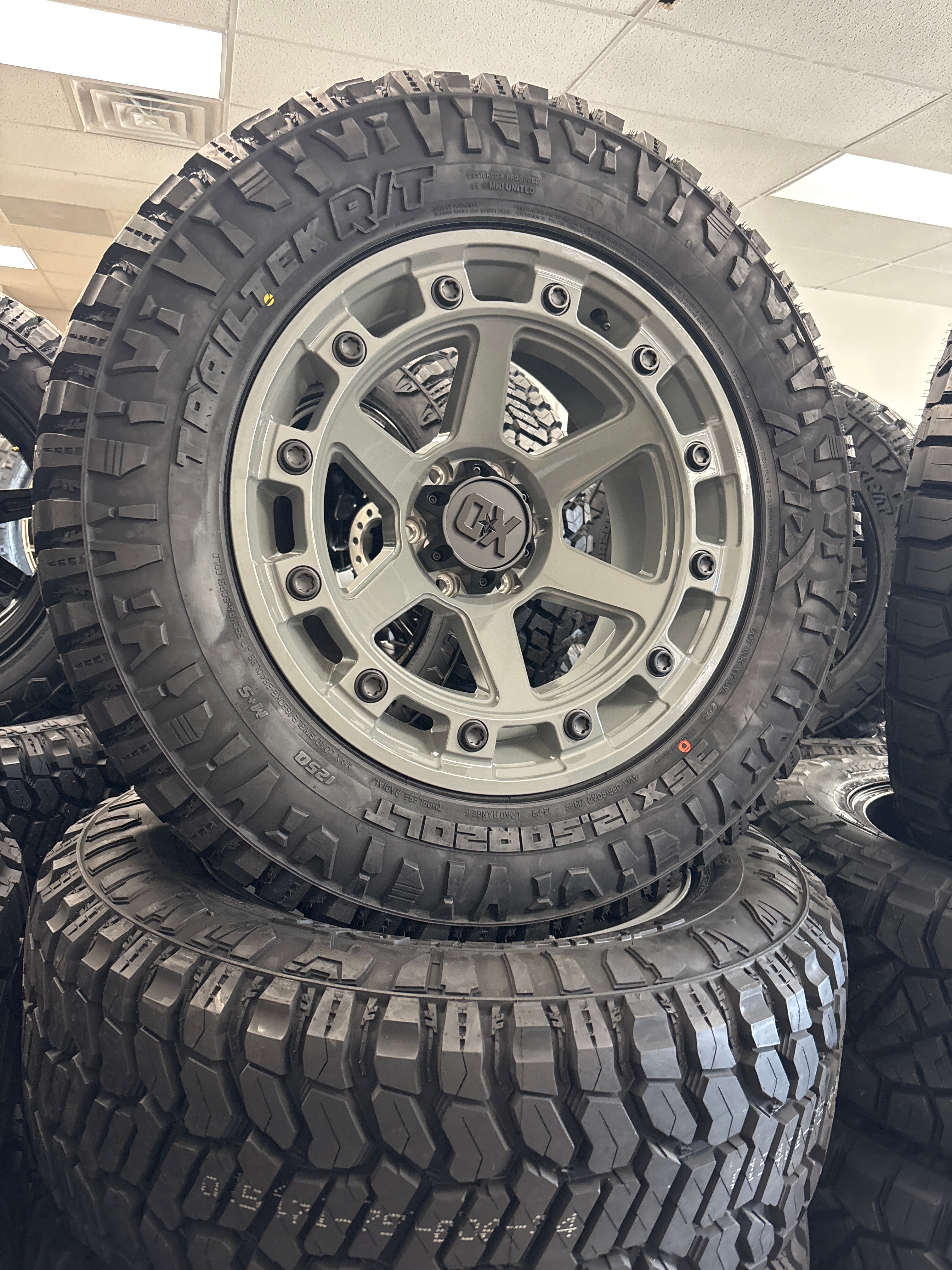 20x10 XD RAID Cement Gray 6x5.5 & 35x12.50R20 Avix R/T