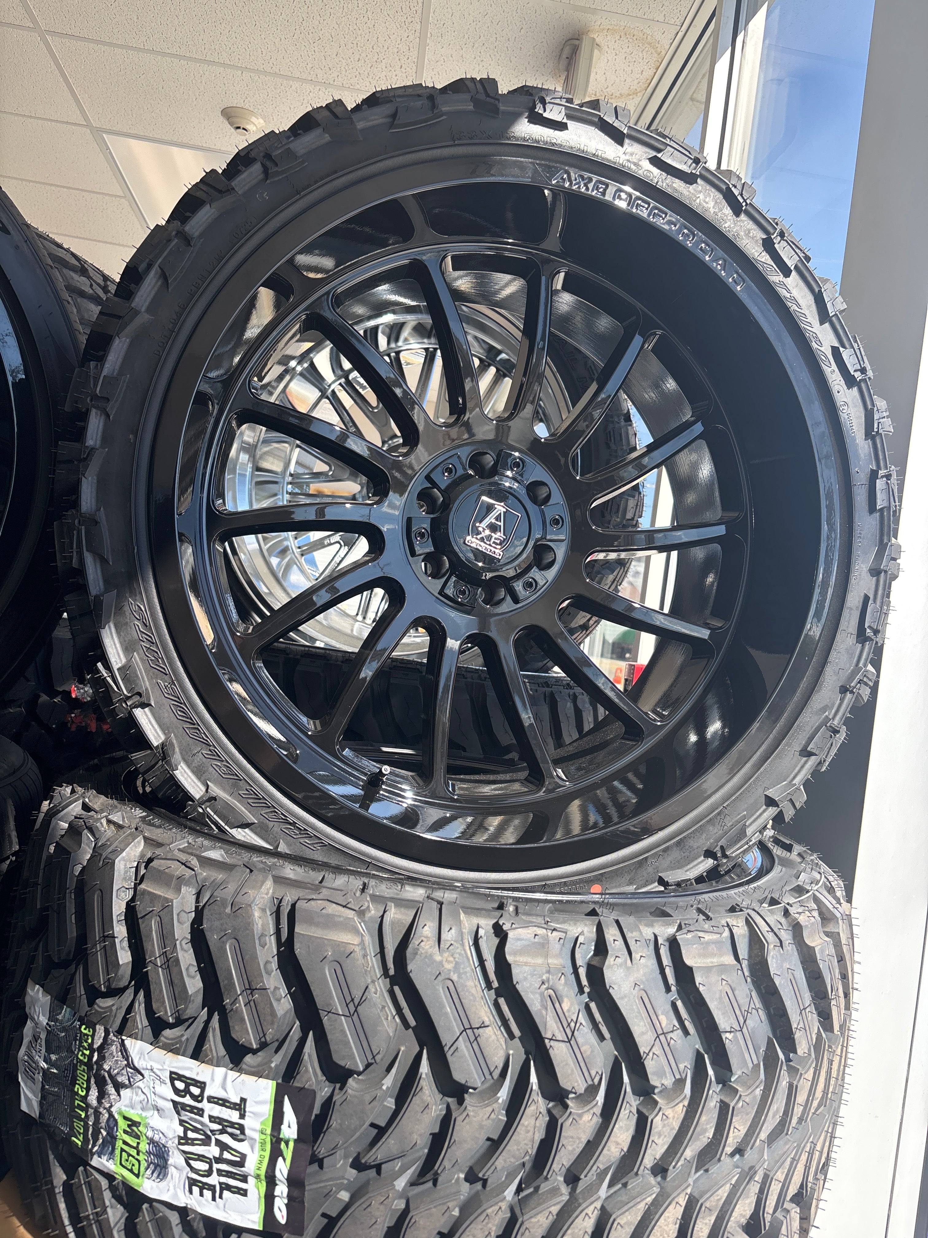 24x12 Axe Chronus GB 6x5.5/ 6x135 & 33x13.50R24 Atturo MTS