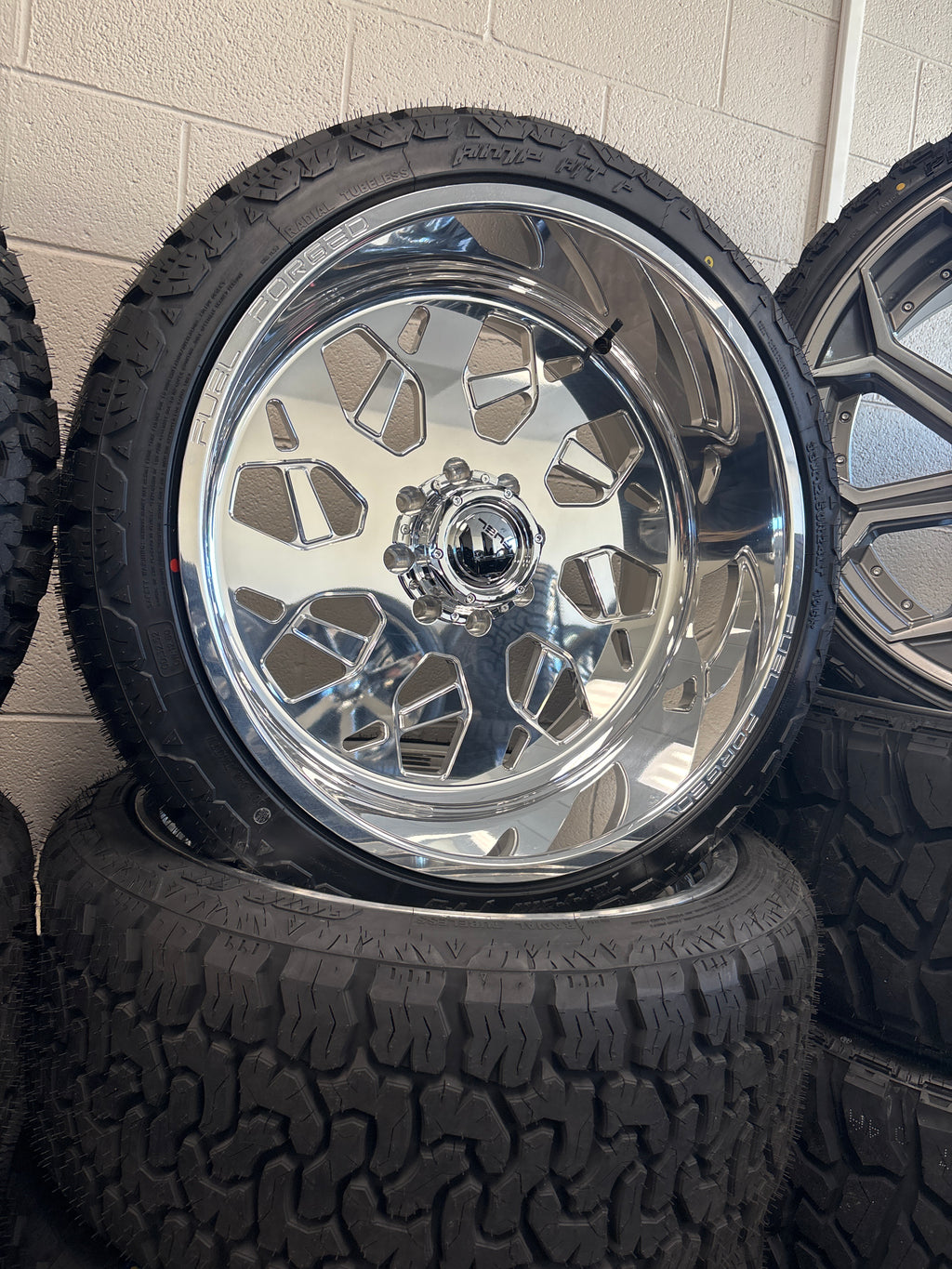 4 - 24x12 Fuel Forged FF111 Polished 8x6.5 & 33x12.50R24 AMP A/T Pro