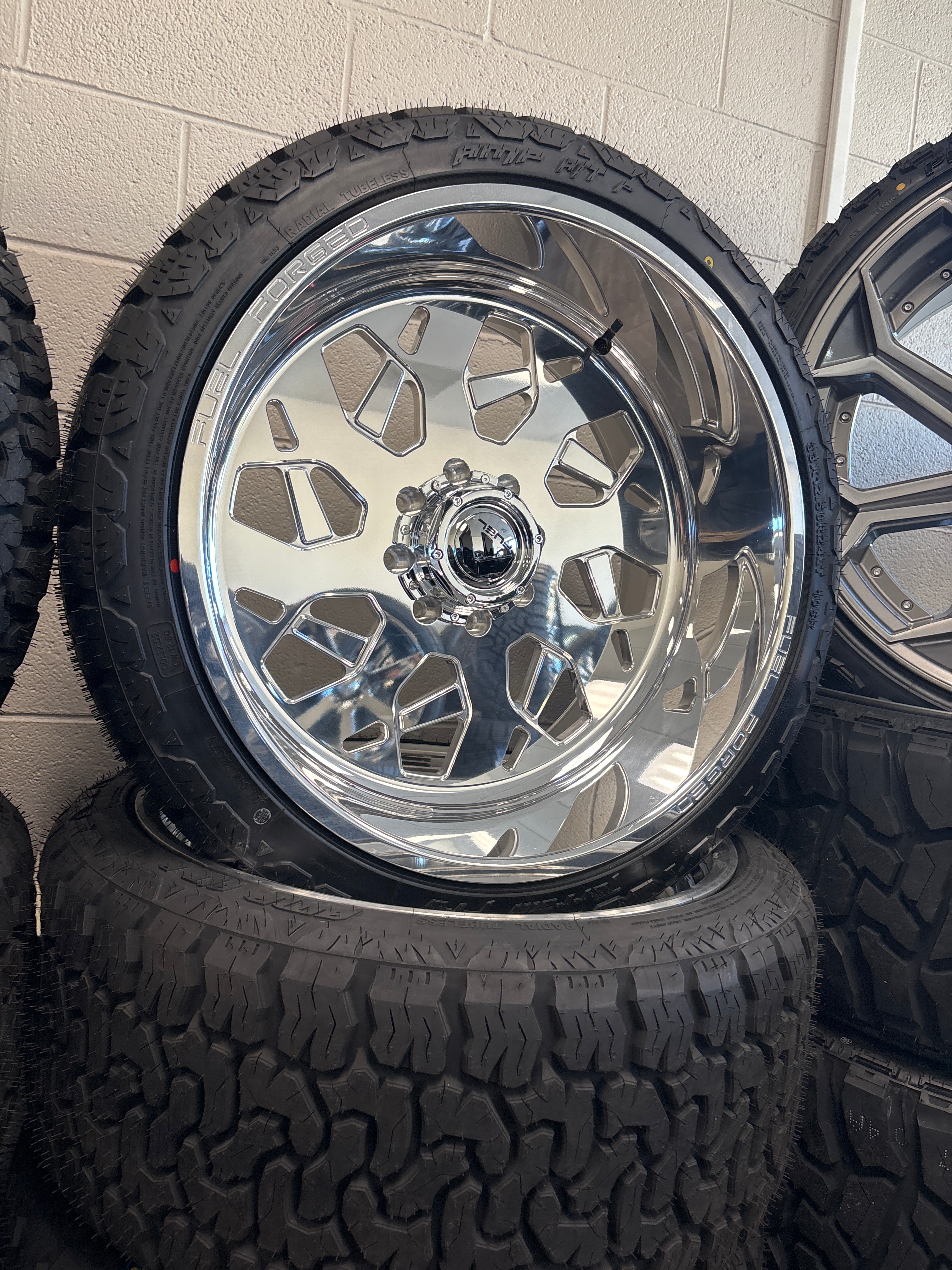 4 - 24x12 Fuel Forged FF111 Polished 8x6.5 & 33x12.50R24 AMP A/T Pro