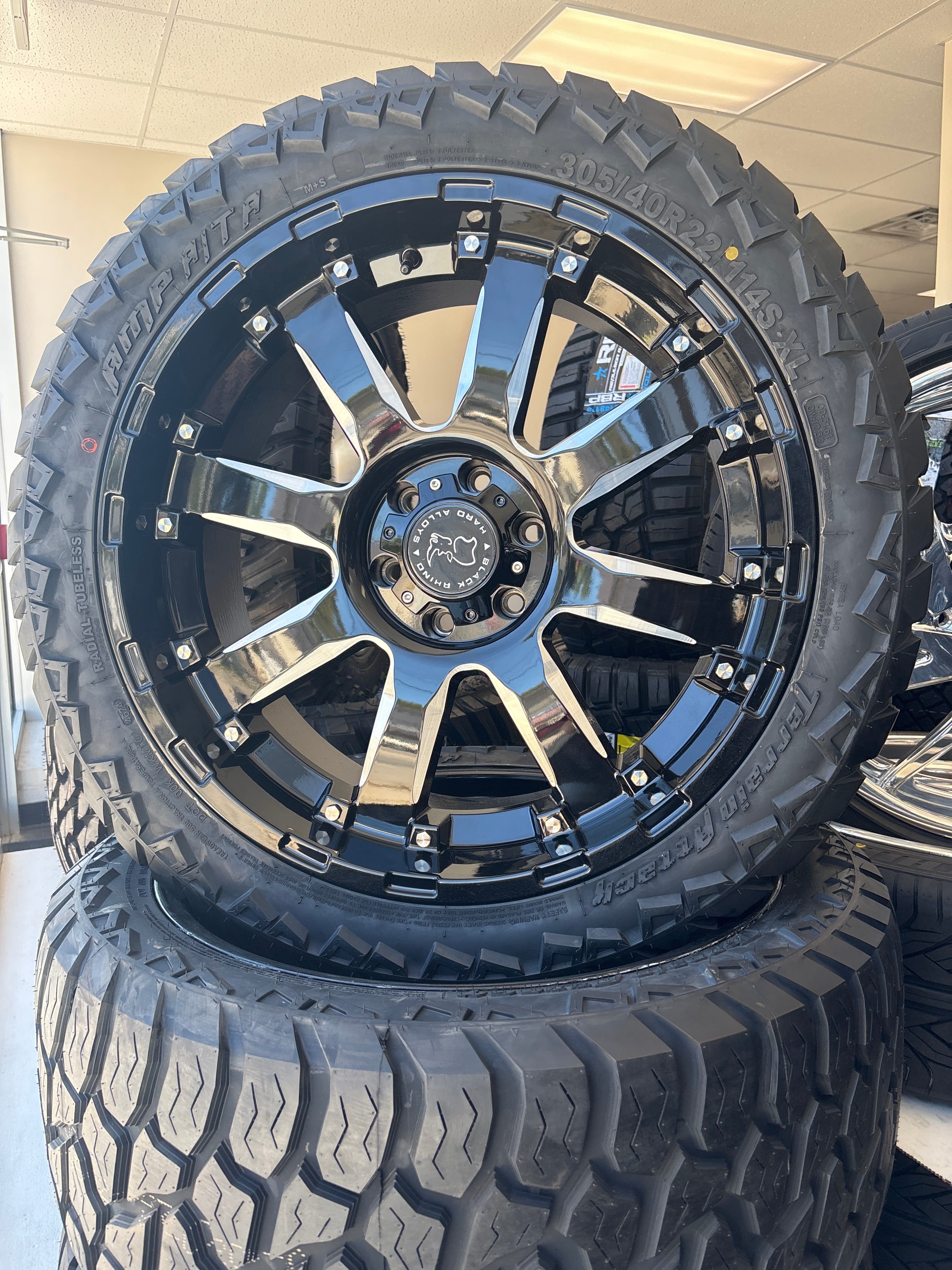 22x10 Black Rhino Sierra GBM 6x5.5 & 305/40R22 AMP ATA
