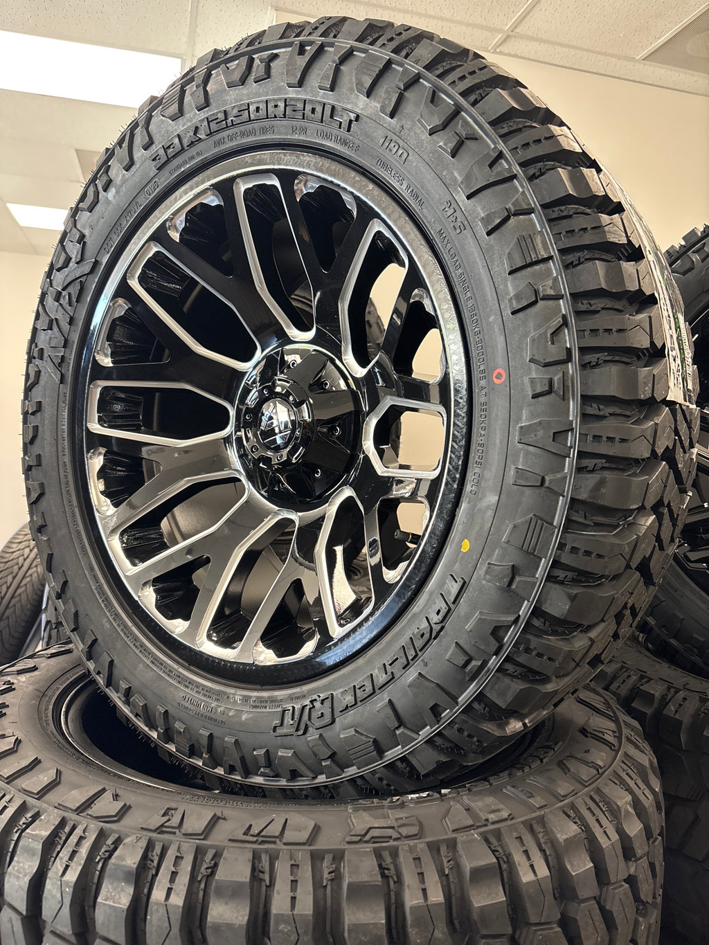 20x10 Fuel Warrior GBM 6x5.5/ 6x135 & 33x12.50R20 Avix R/T