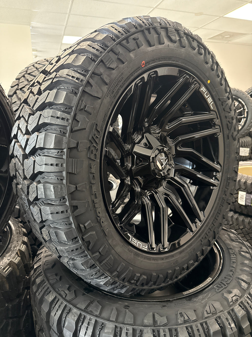 20x10 Fuel Typhoon 6x5.5/ 6x135 & 33x12.50R20 Avix R/T