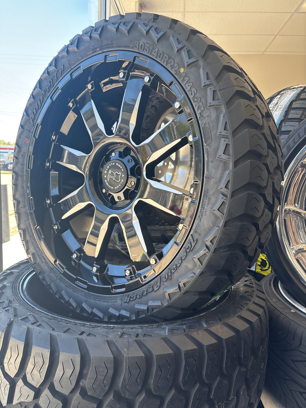 22x10 Black Rhino Sierra GBM 6x5.5 & 305/40R22 AMP ATA