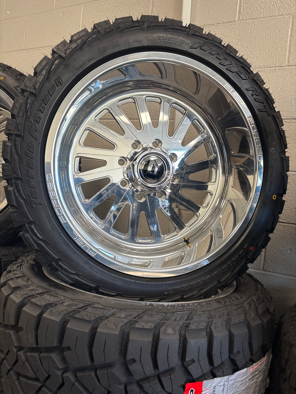 22x12 Fuel Forged FF016 Polished 8x180 & 33x12.50R22 AMP R/T