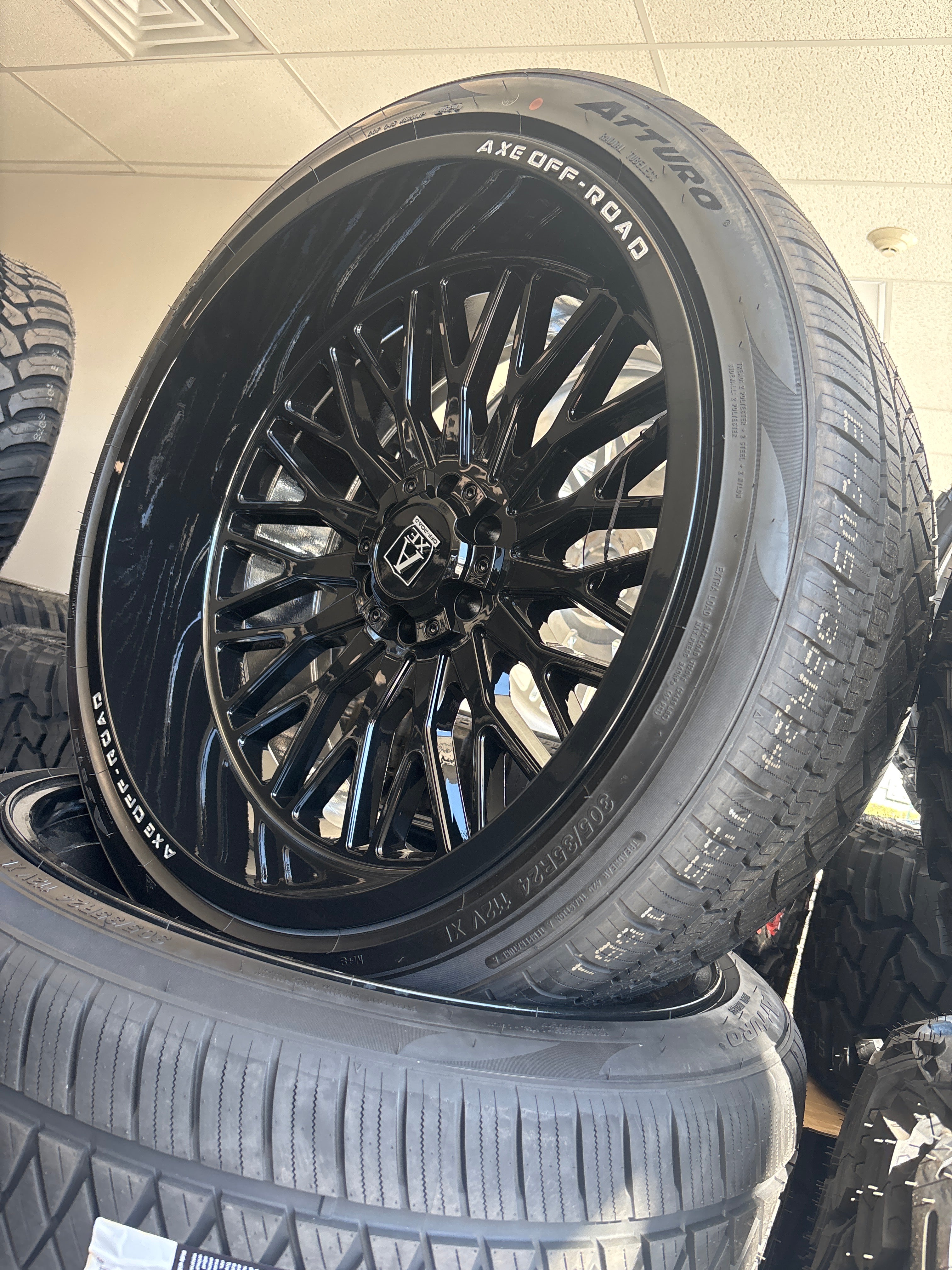 24x12 Axe Kratos GB 6x5.5/ 6x135 & 305/35R24 Atturo AZ810