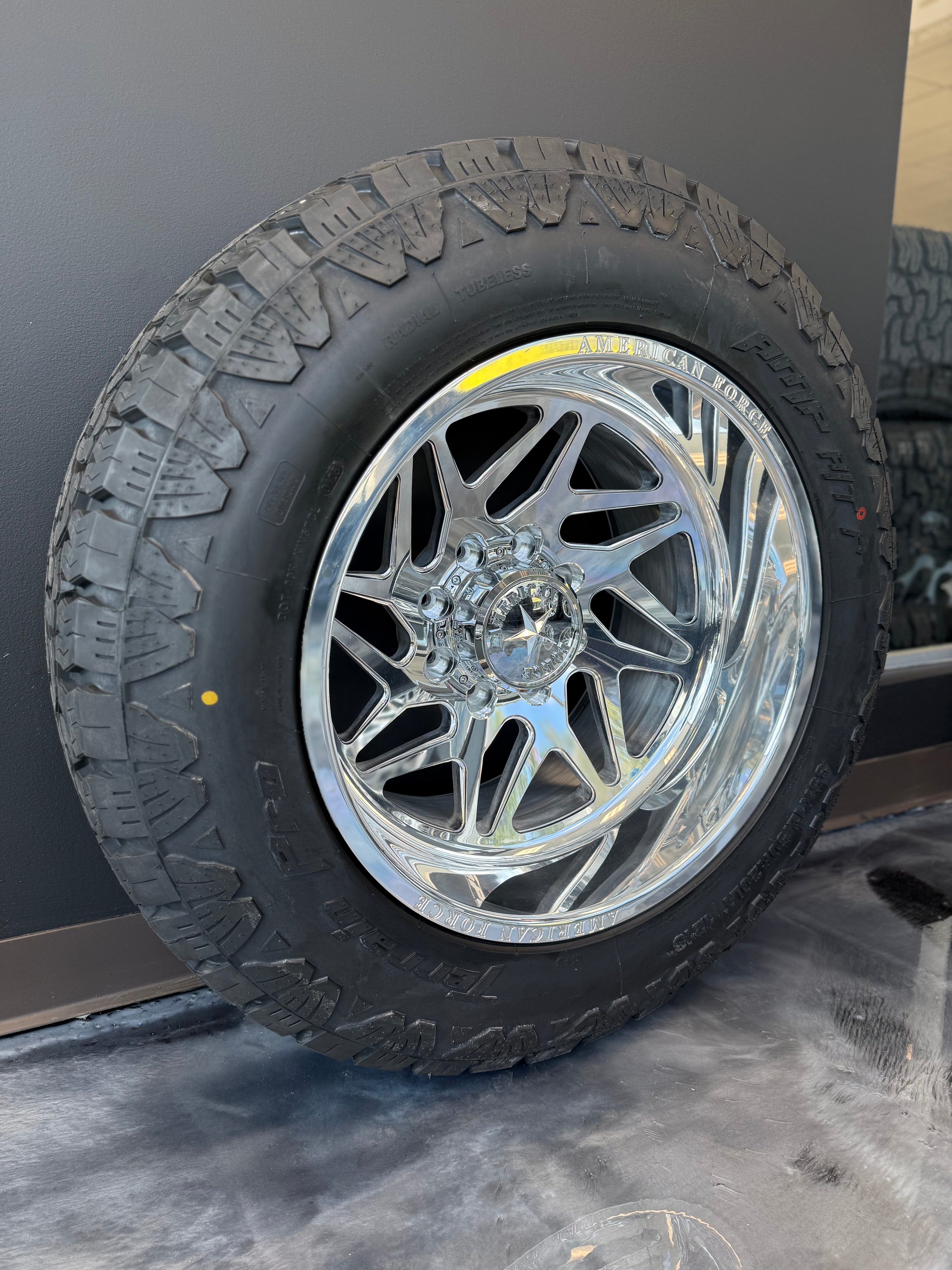 20x12 American Force Genesis CC 8x6.5 & 35x12.50R20 AMP AT PRO