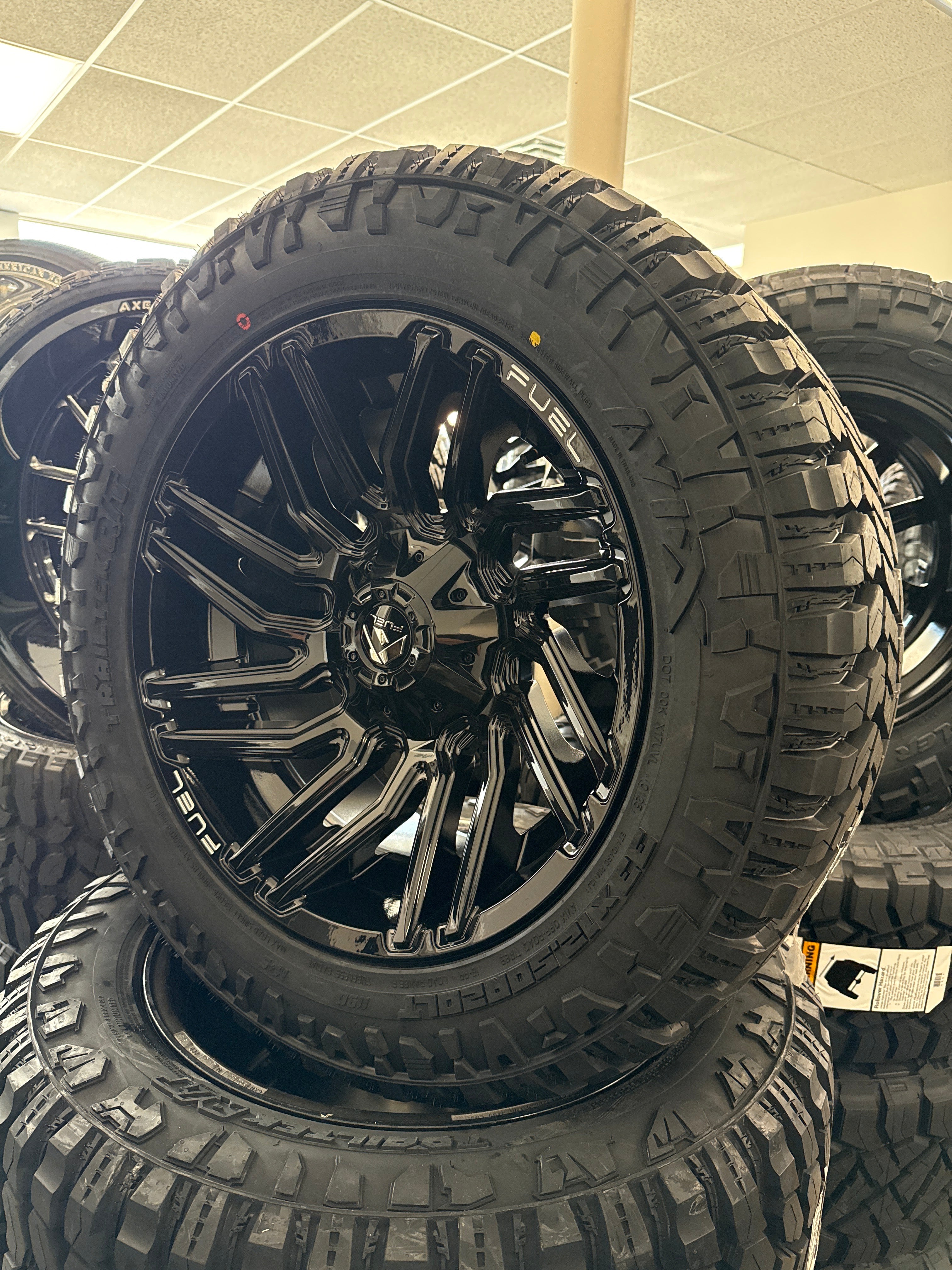 20x10 Fuel Typhoon 6x5.5/ 6x135 & 33x12.50R20 Avix R/T