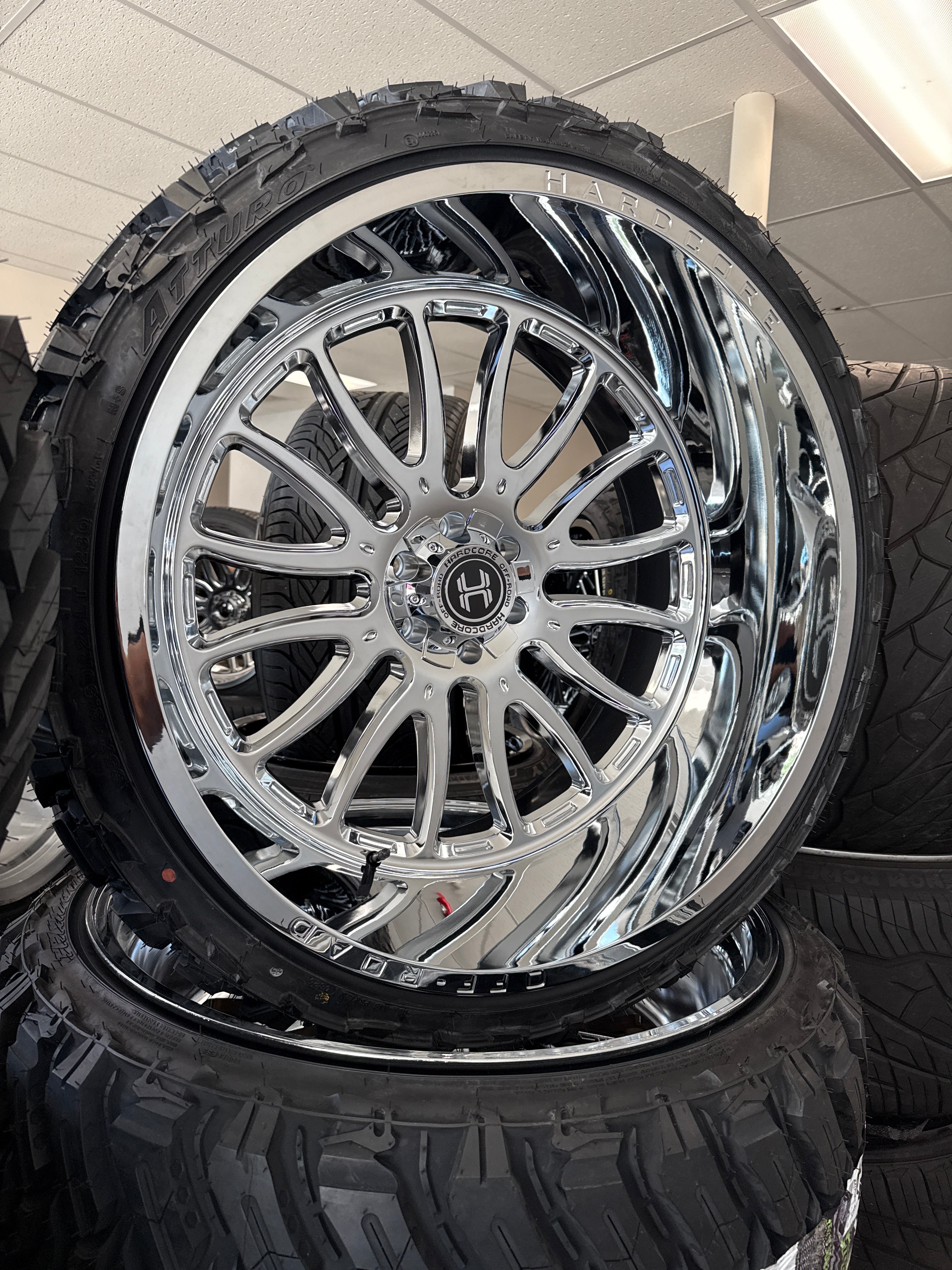 26x14 Hardcore HC101 Chrome 6x5.5/ 6x135 & 35x13.50R26 Atturo MTS
