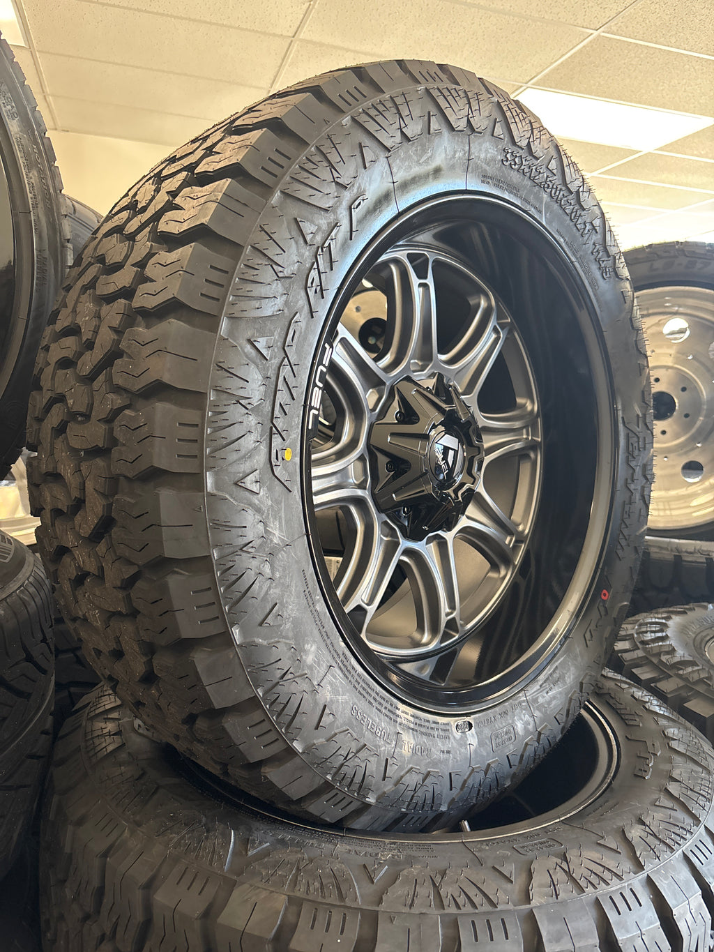 20x10 Fuel Darkstar 6x5.5/ 6x135 8 33x12.50R20 AMP A/T Pro