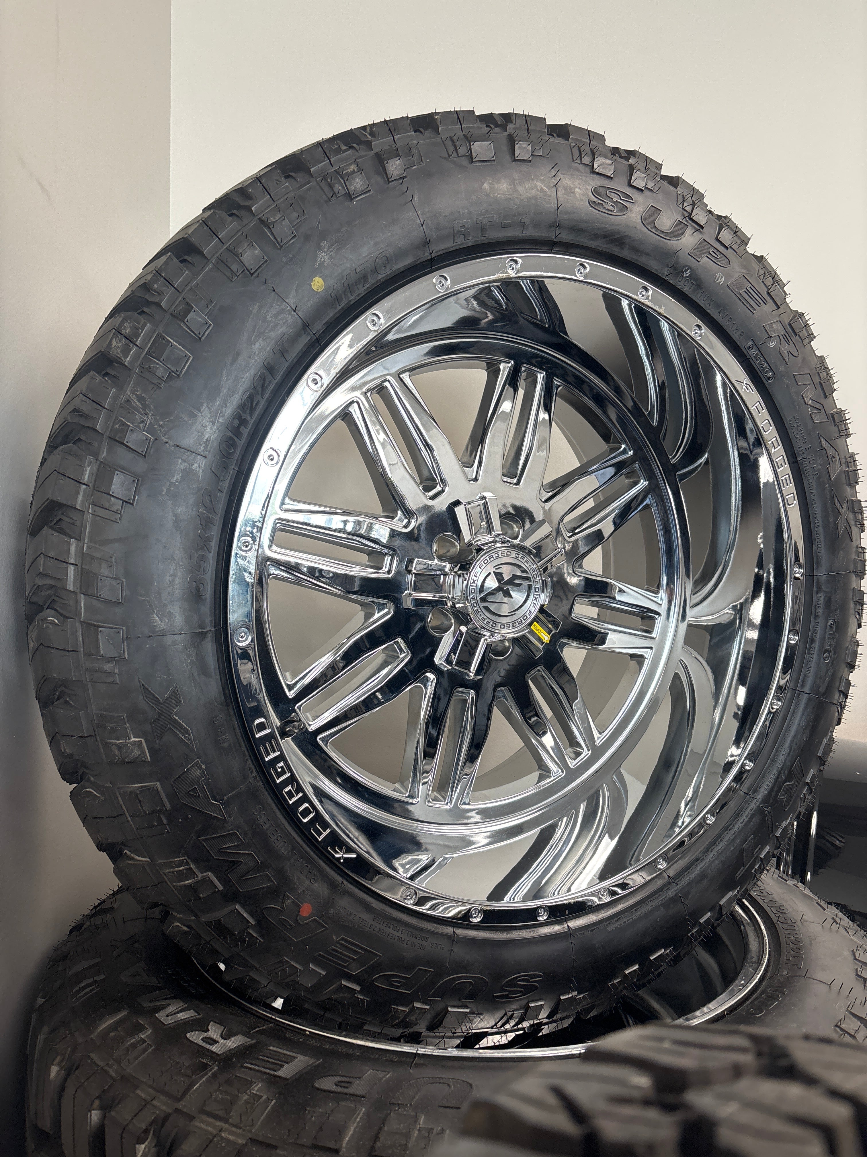 22x12 XF303 Chrome 5x5/ 5x114.3 & 35x12.50R22 Supermax R/T