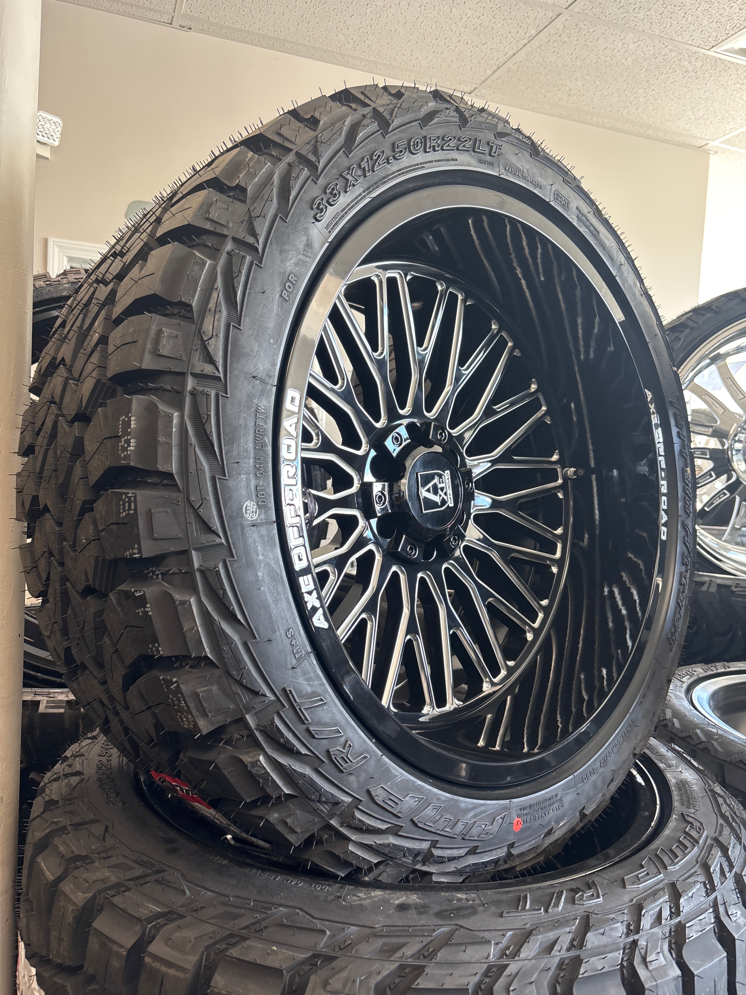 22x12 Axe Kratos GBM 6x5.5/ 6x135 & 33x12.50R22 AMP R/T