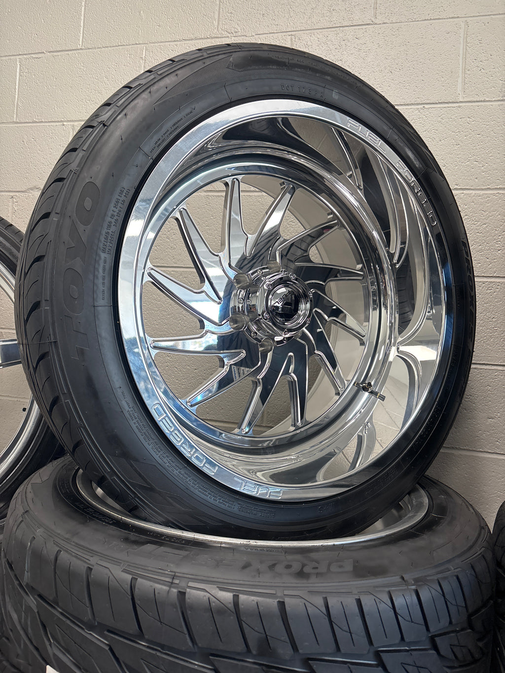 22x12 Fuel Forged FF110 6x5.5 Polished & 305/40R22 Toyo Proxes ST3
