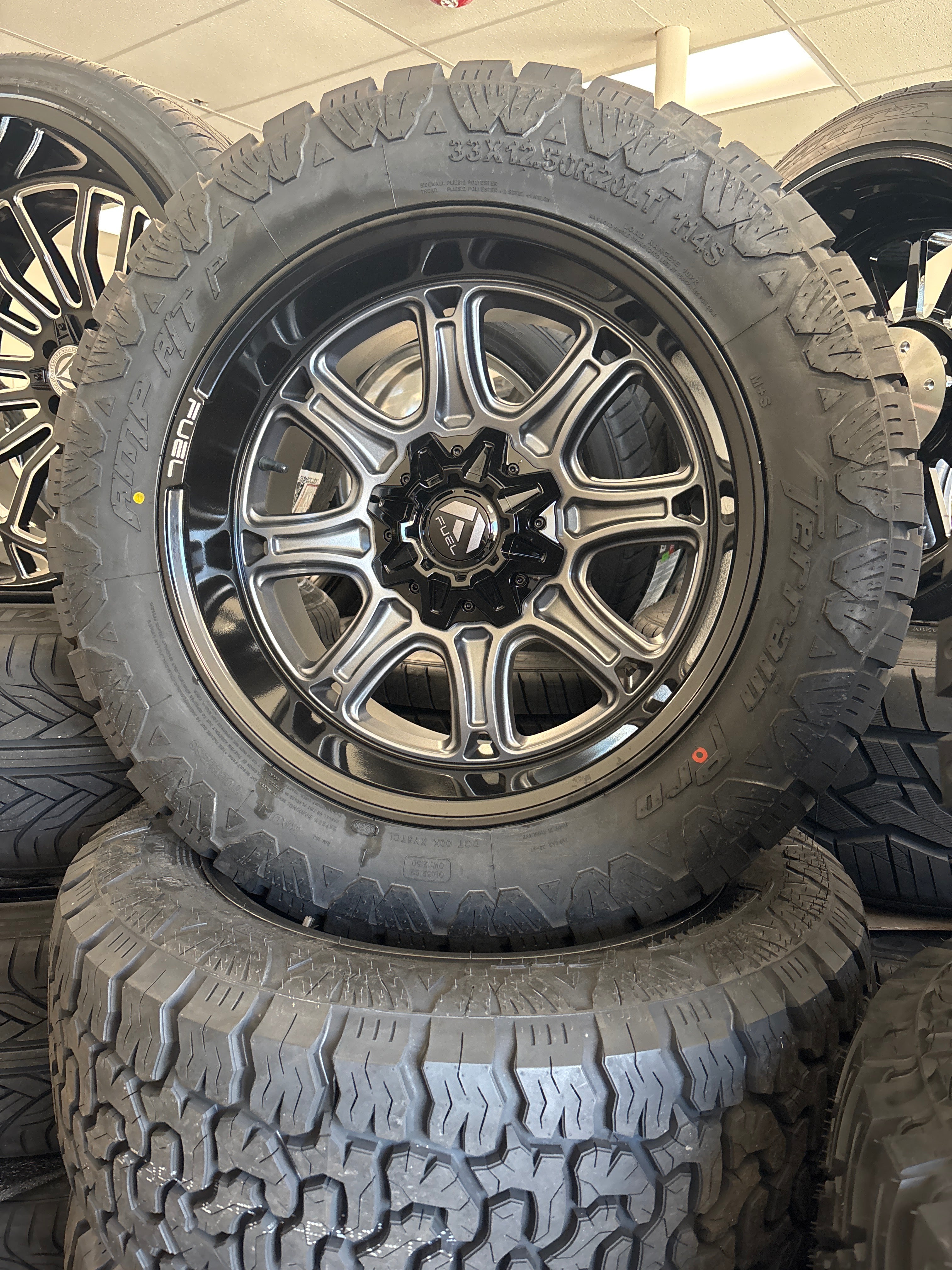 20x10 Fuel Darkstar 6x5.5/ 6x135 8 33x12.50R20 AMP A/T Pro