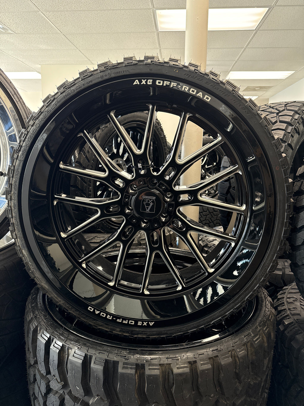 26x12 Axe Atlas GBM 6x5.5/ 6x135 & 33x12.50R26 Mileking MT