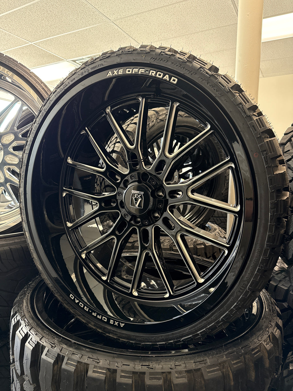 26x12 Axe Atlas GBM 6x5.5/ 6x135 & 33x12.50R26 Mileking MT