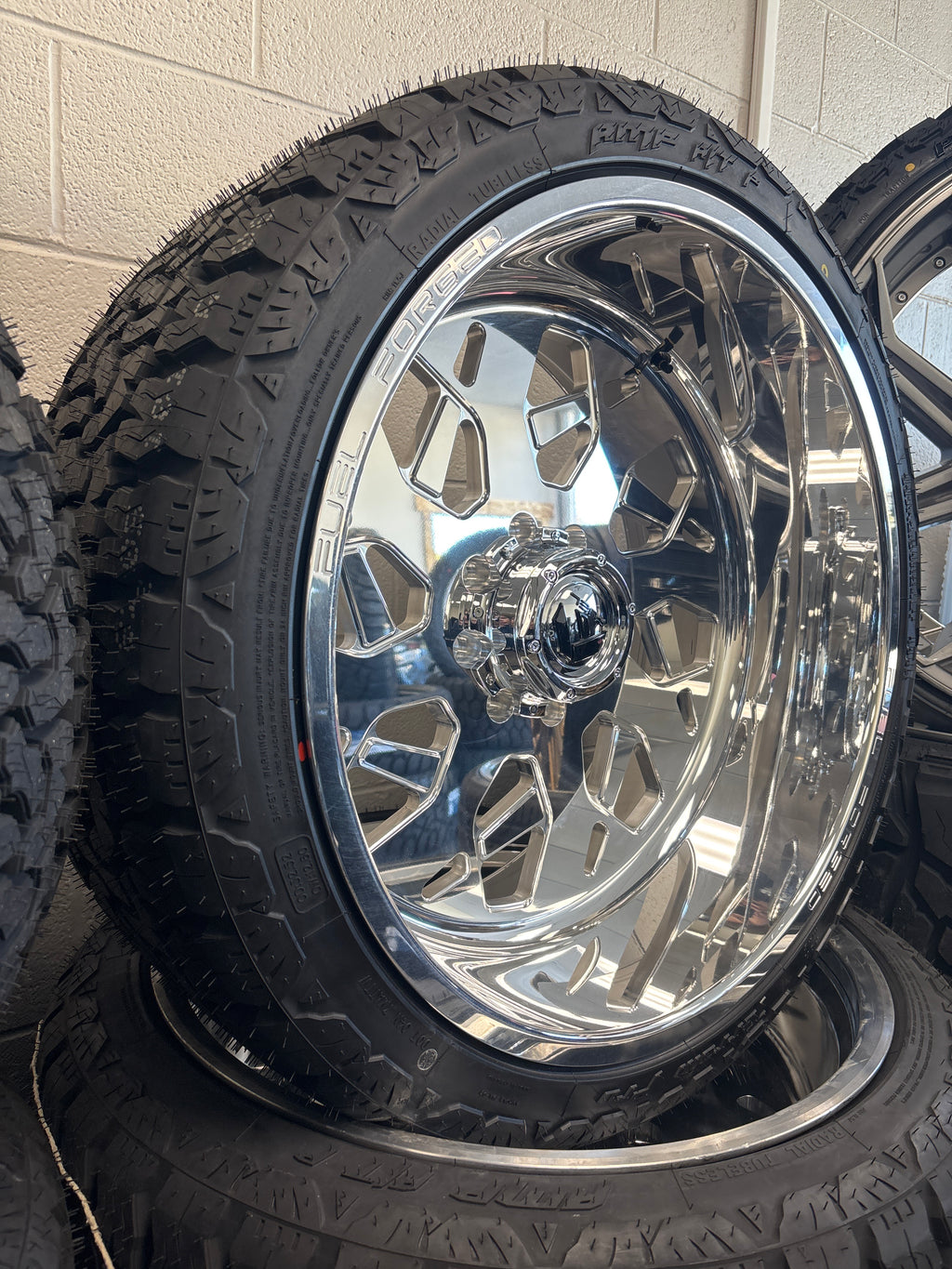 4 - 24x12 Fuel Forged FF111 Polished 8x6.5 & 33x12.50R24 AMP A/T Pro