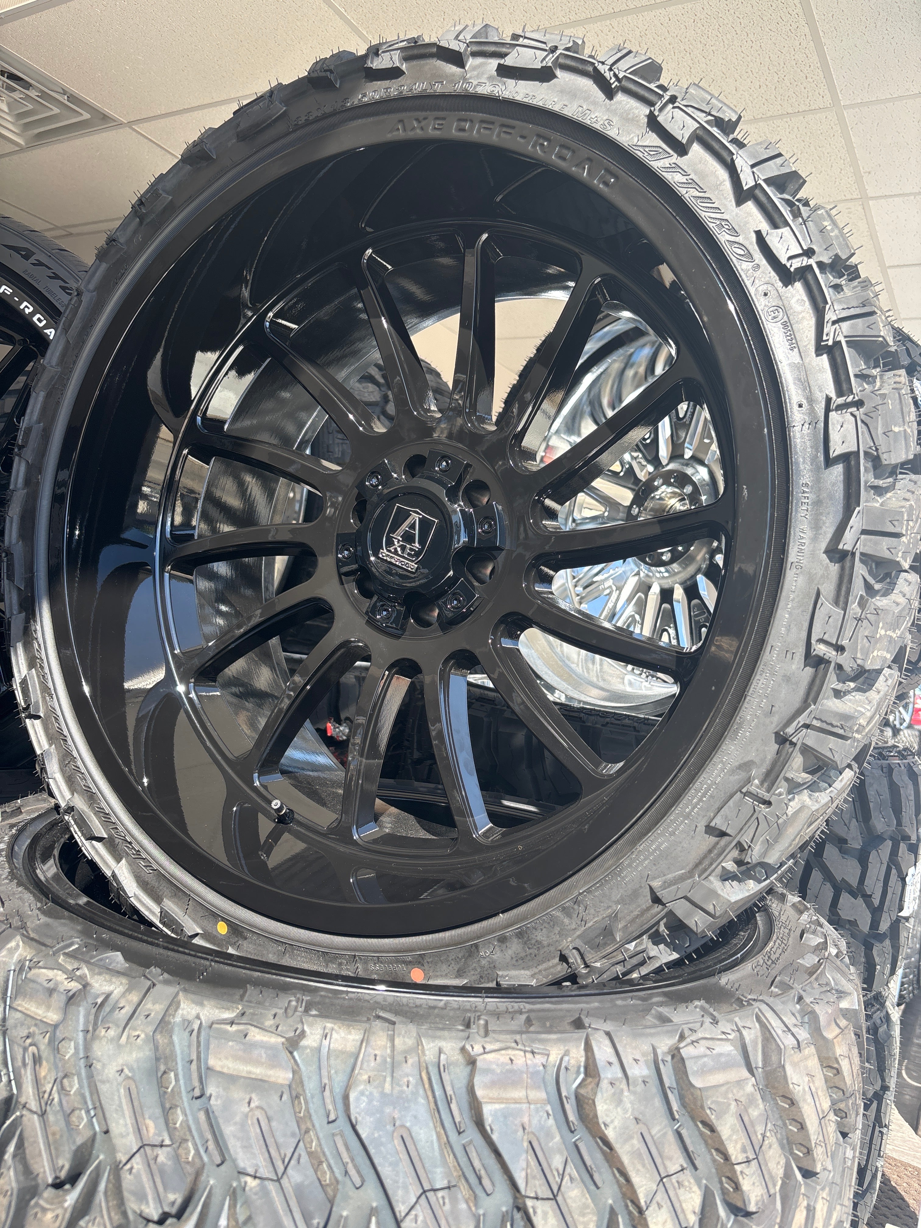 24x12 Axe Chronus GB 6x5.5/ 6x135 & 33x13.50R24 Atturo MTS