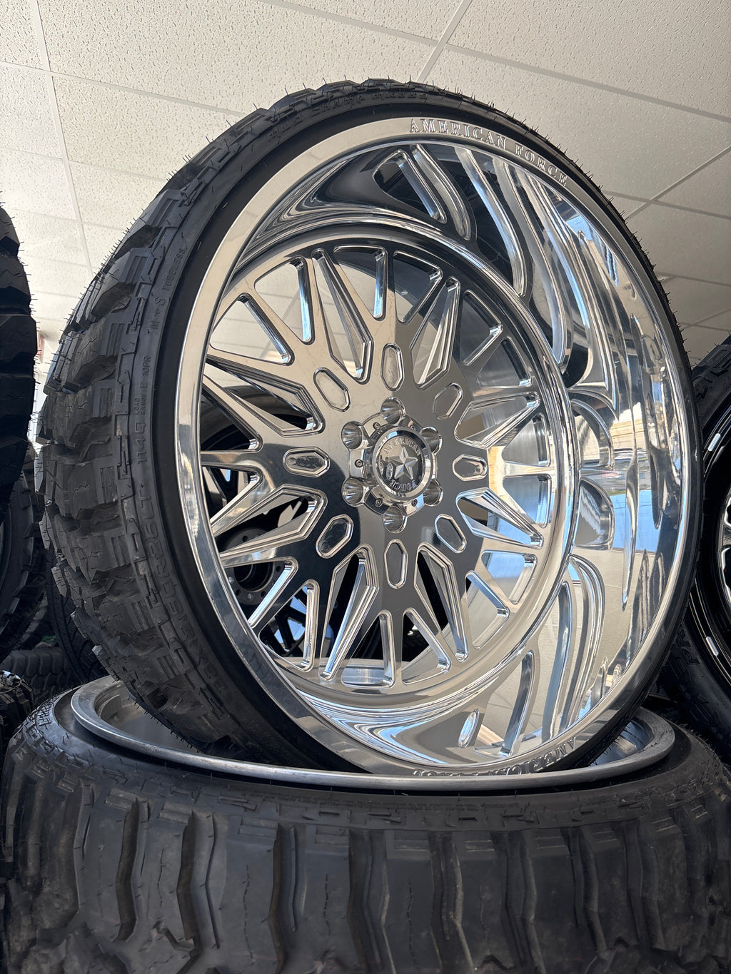 *CLEARANCE 26x12 American Force Iceberg 6x5.5 & 33x12.50R26 Mileking M/T