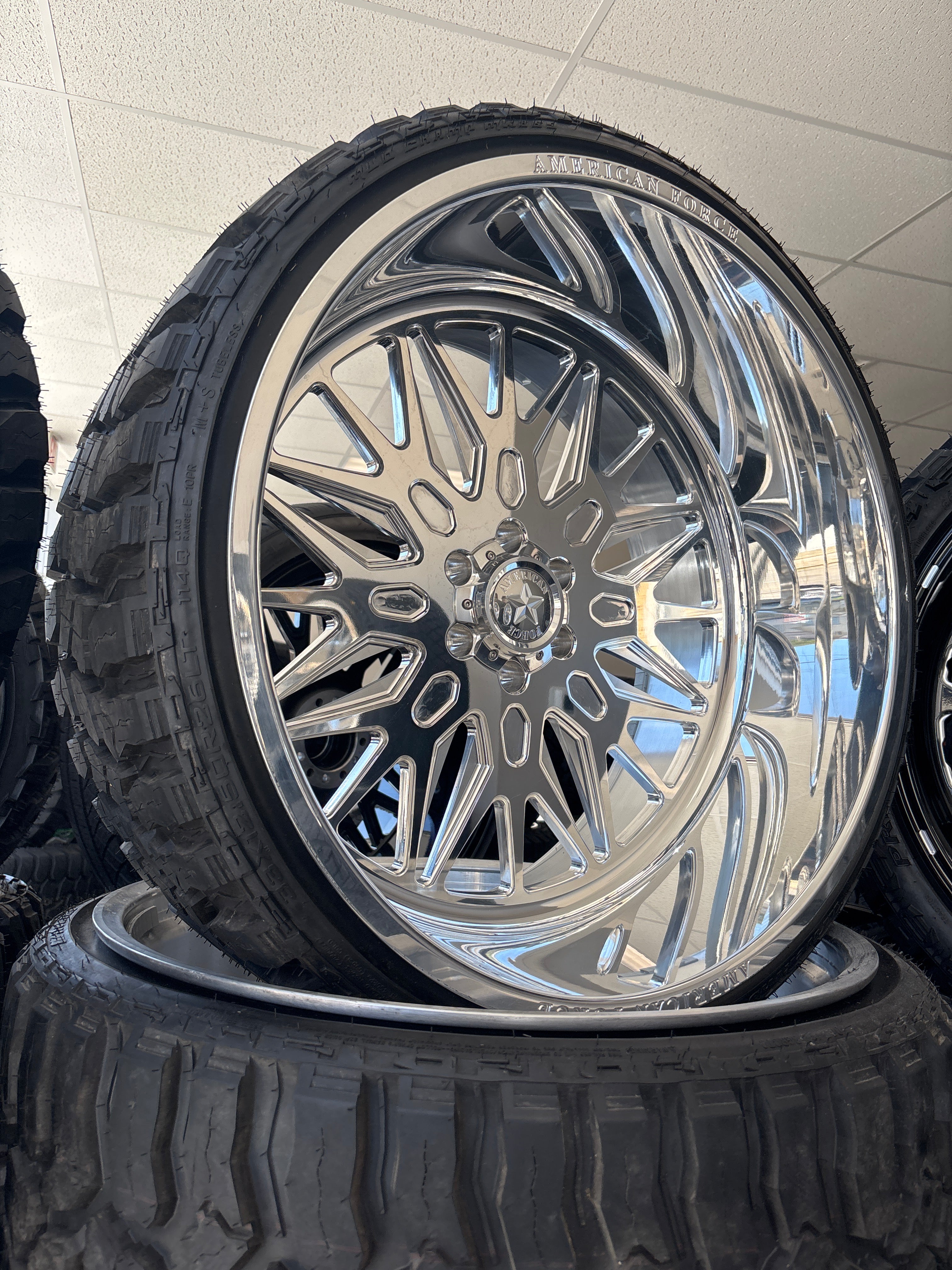 *CLEARANCE 26x12 American Force Iceberg 6x5.5 & 33x12.50R26 Mileking M/T