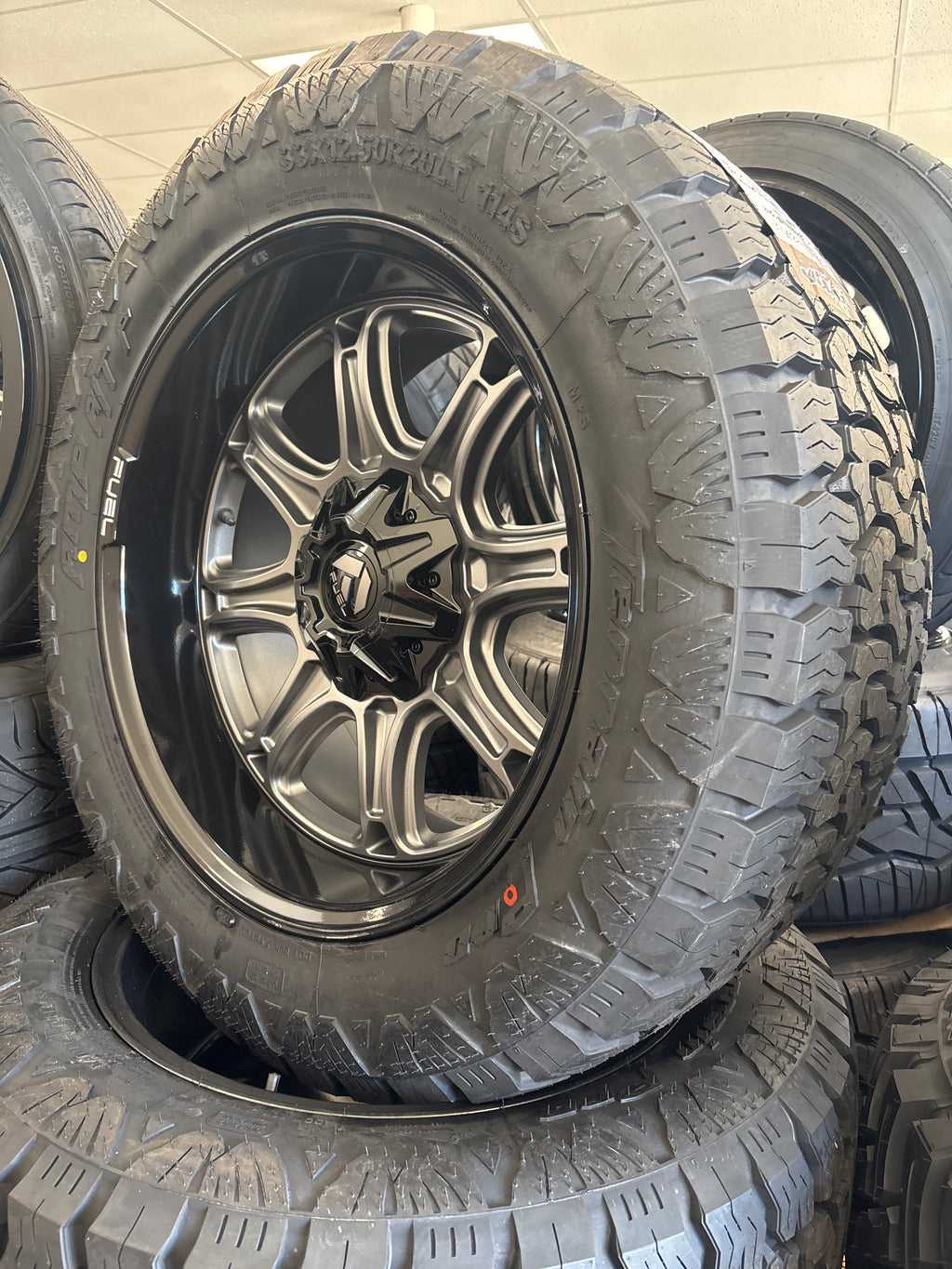 20x10 Fuel Darkstar 6x5.5/ 6x135 8 33x12.50R20 AMP A/T Pro