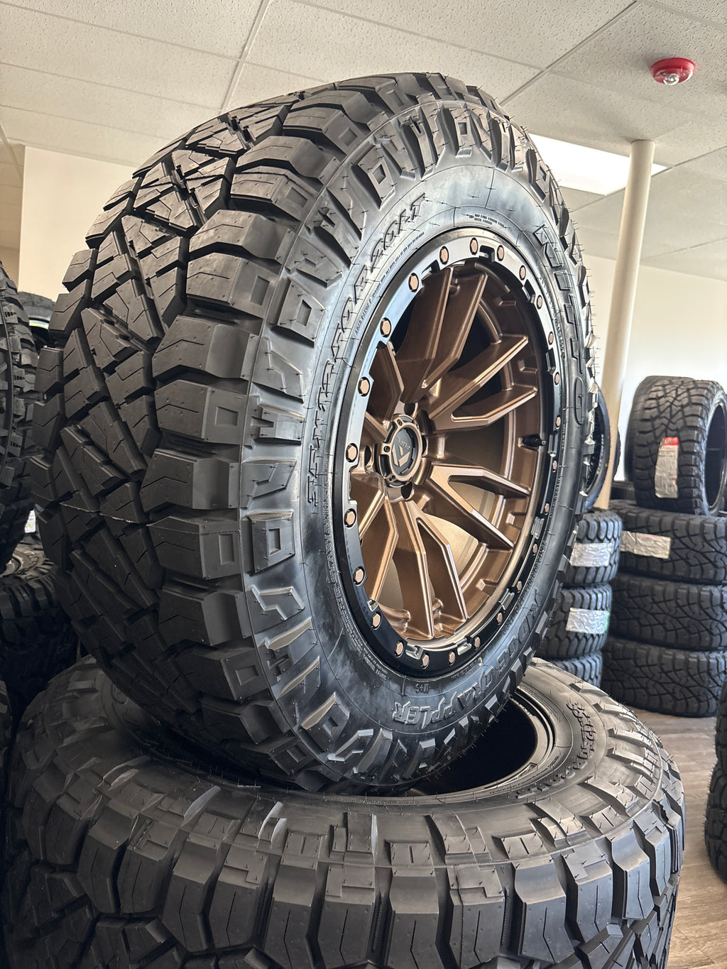 20x10 Fuel Rebel Bronze 6x135 & 35x12.50R20 Nitto Ridge Grappler