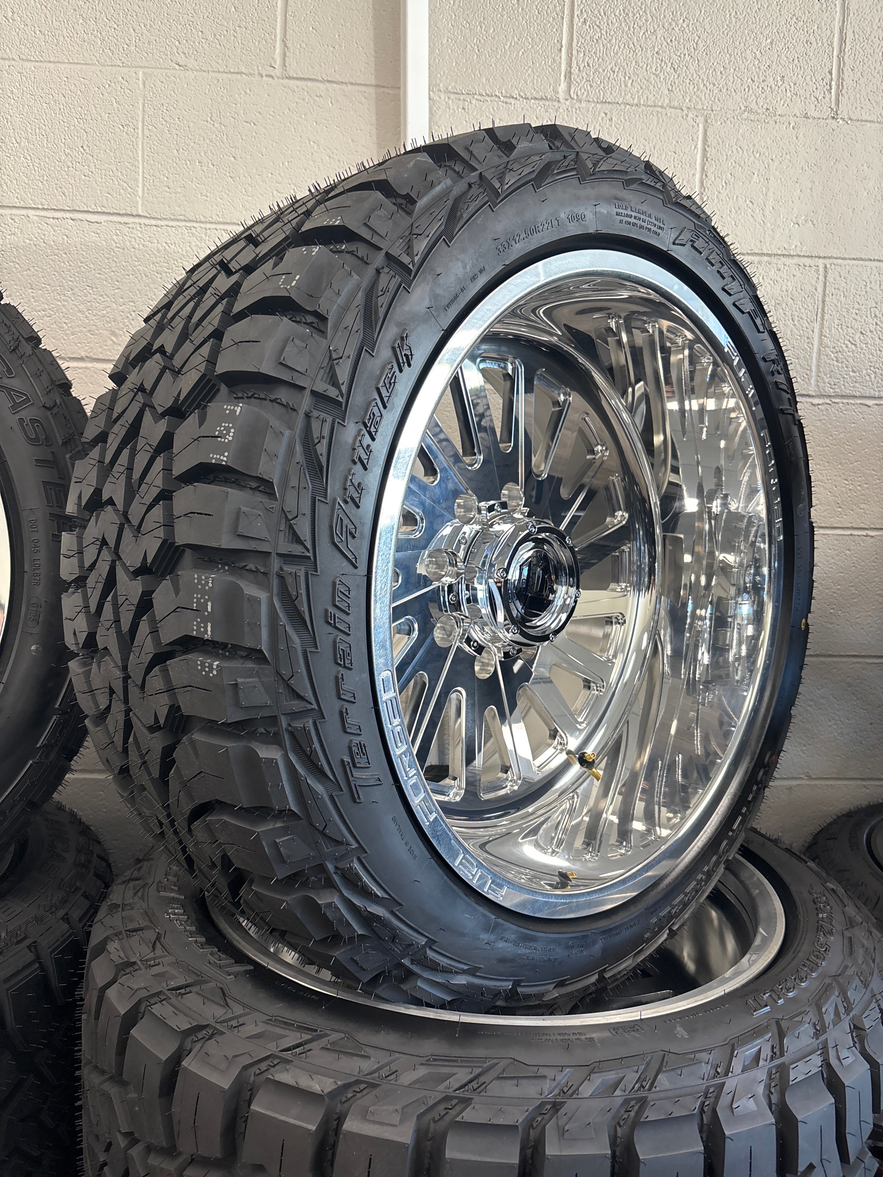 22x12 Fuel Forged FF016 Polished 8x180 & 33x12.50R22 AMP R/T