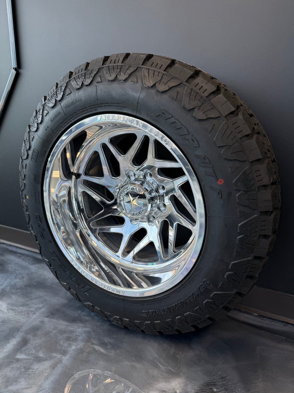 20x12 American Force Genesis CC 8x6.5 & 35x12.50R20 AMP AT PRO