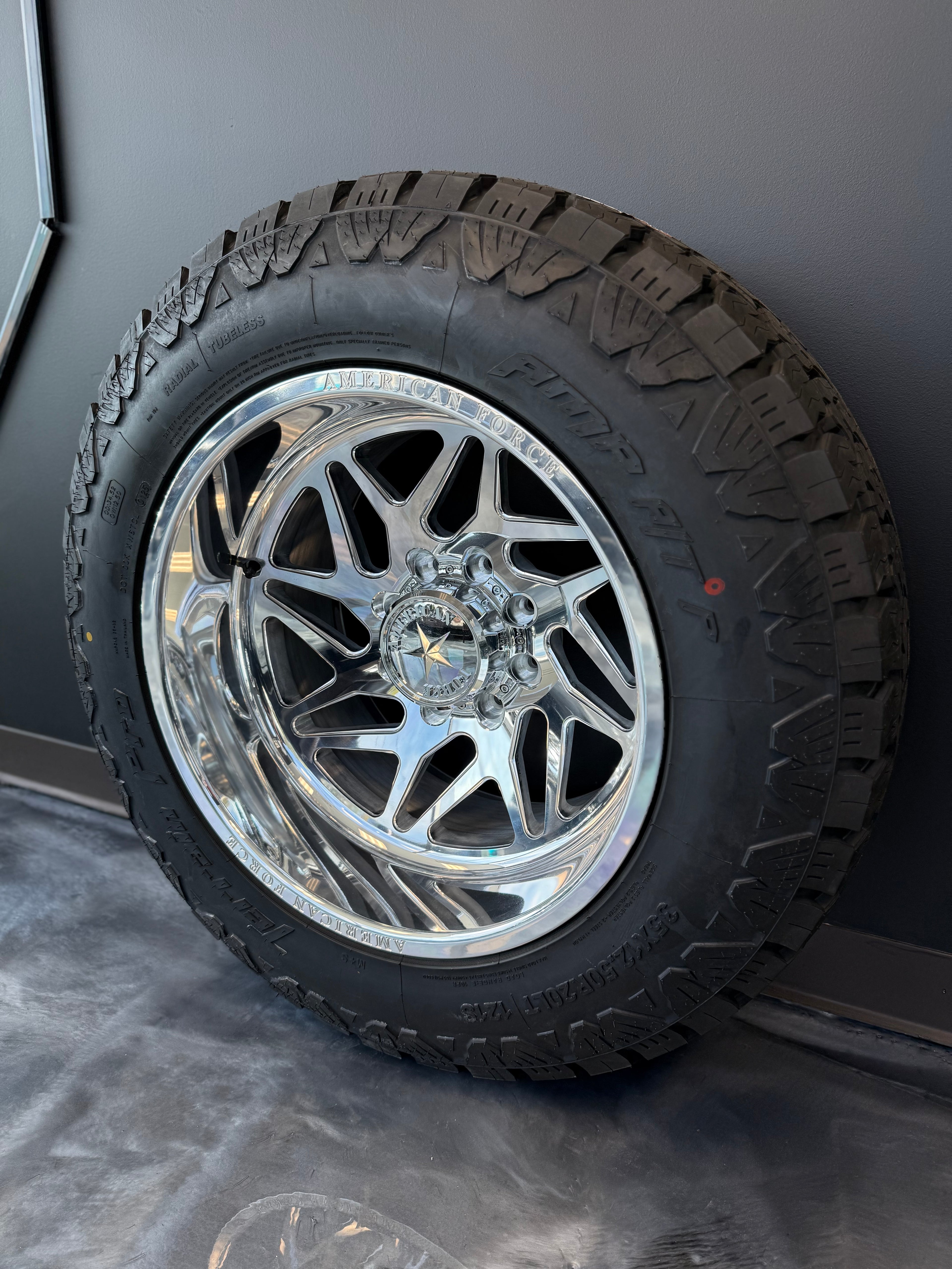 20x12 American Force Genesis CC 8x6.5 & 35x12.50R20 AMP AT PRO