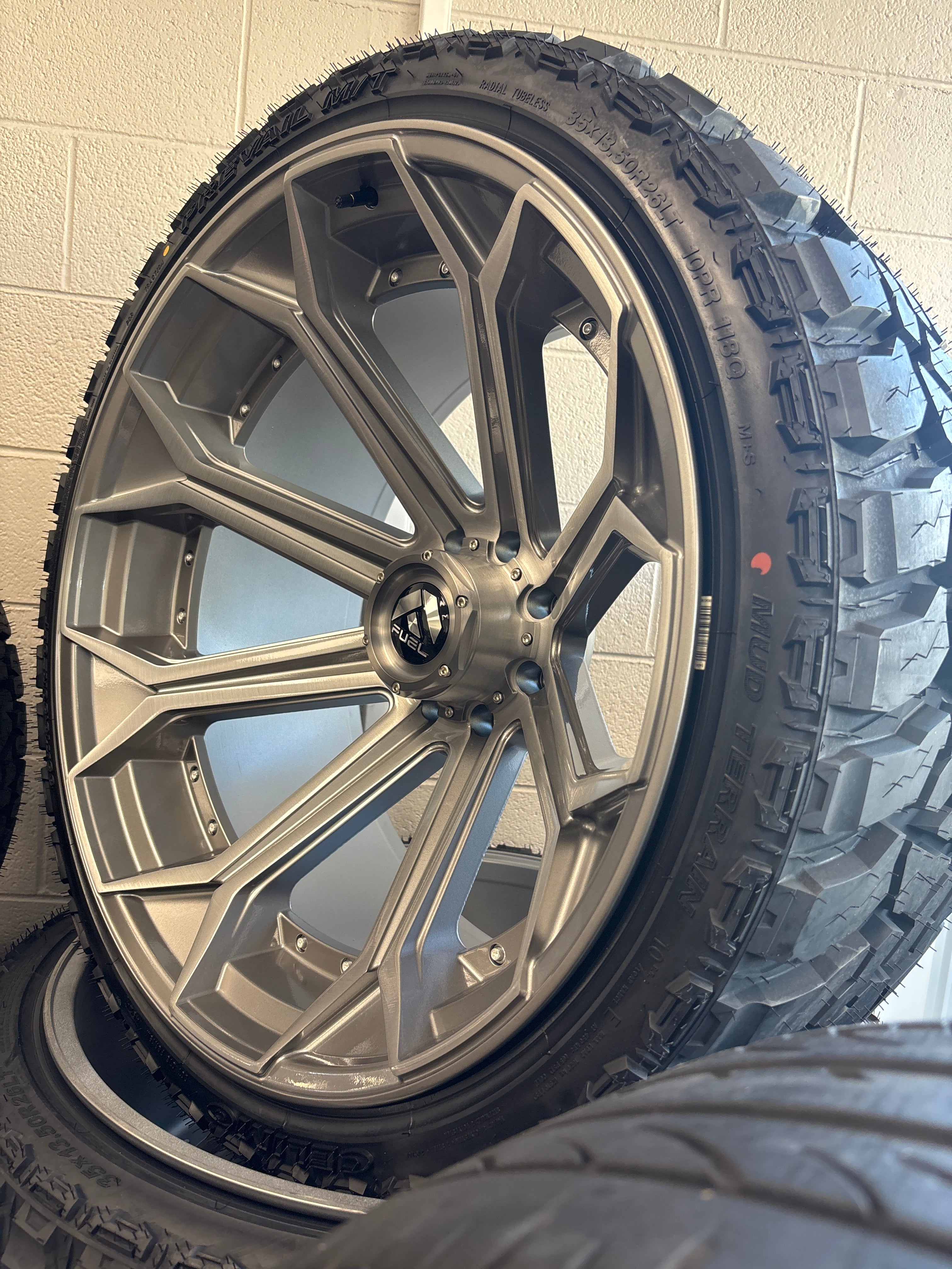 26x14 Fuel Siege Silver 8x170 & 35x13.50R26 Celimo M/T