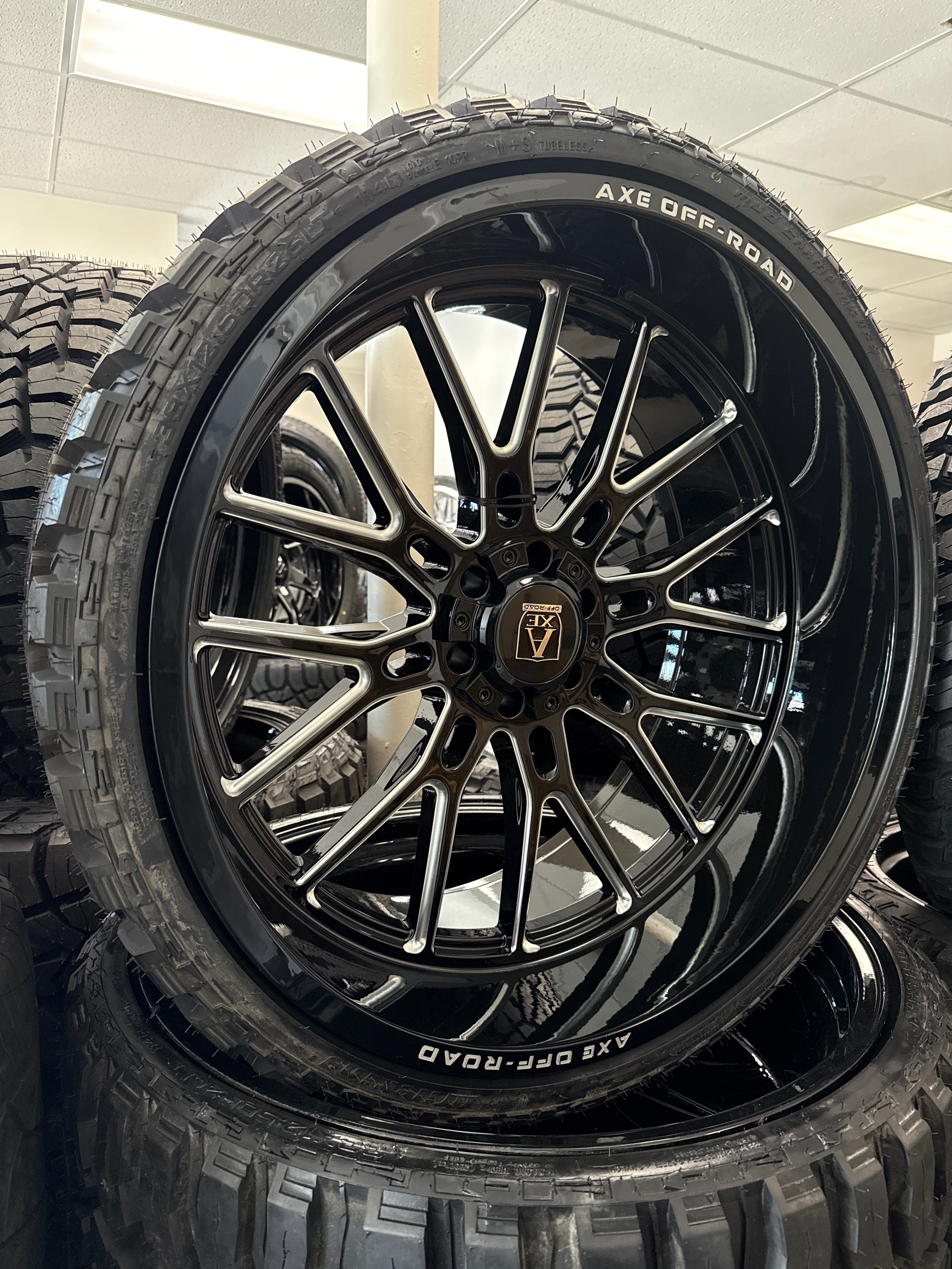 26x12 Axe Atlas GBM 6x5.5/ 6x135 & 33x12.50R26 Mileking MT