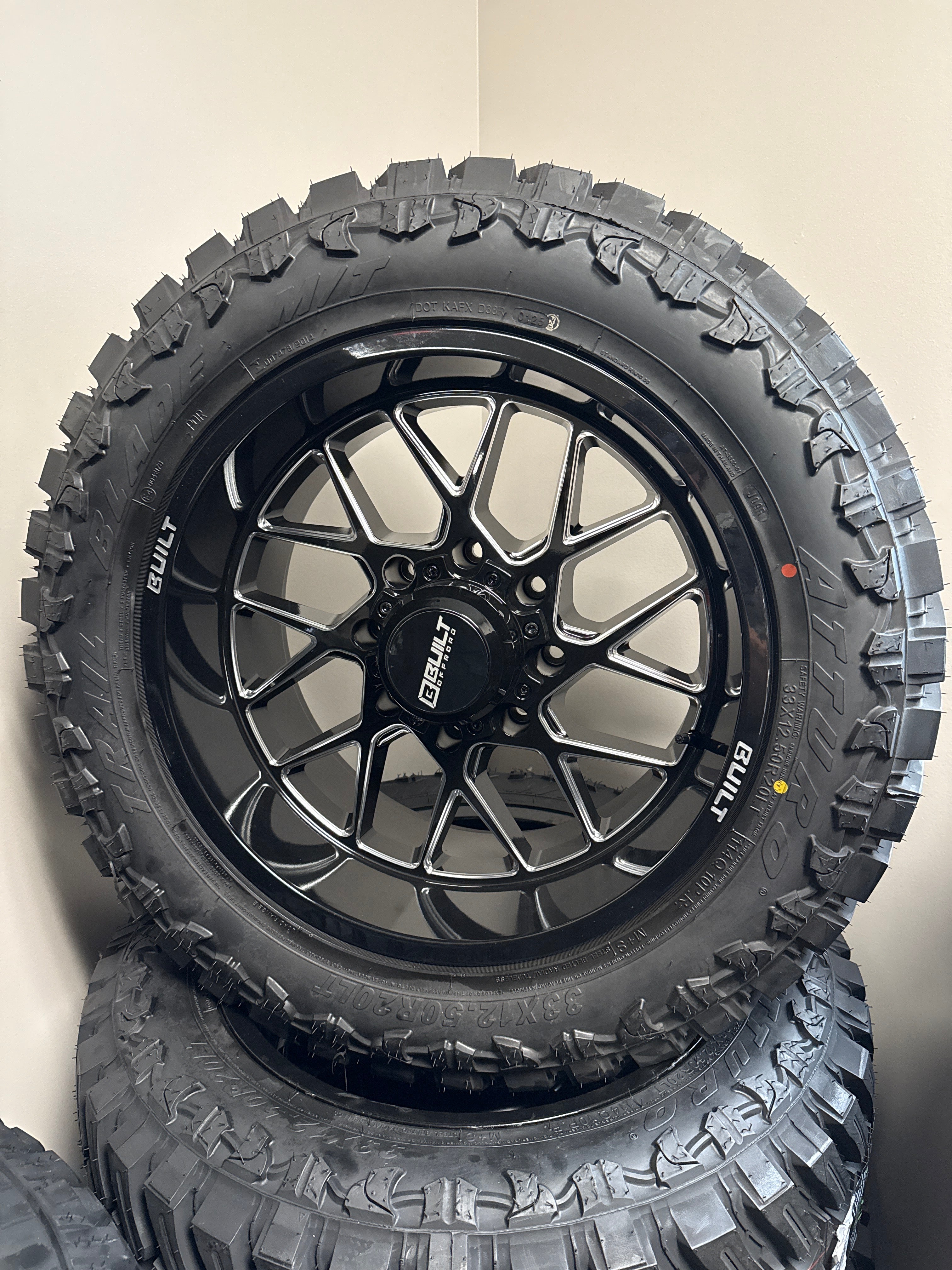 20x10 Built BT03 8x180 GBM & 33x12.50R20 Atturo MT