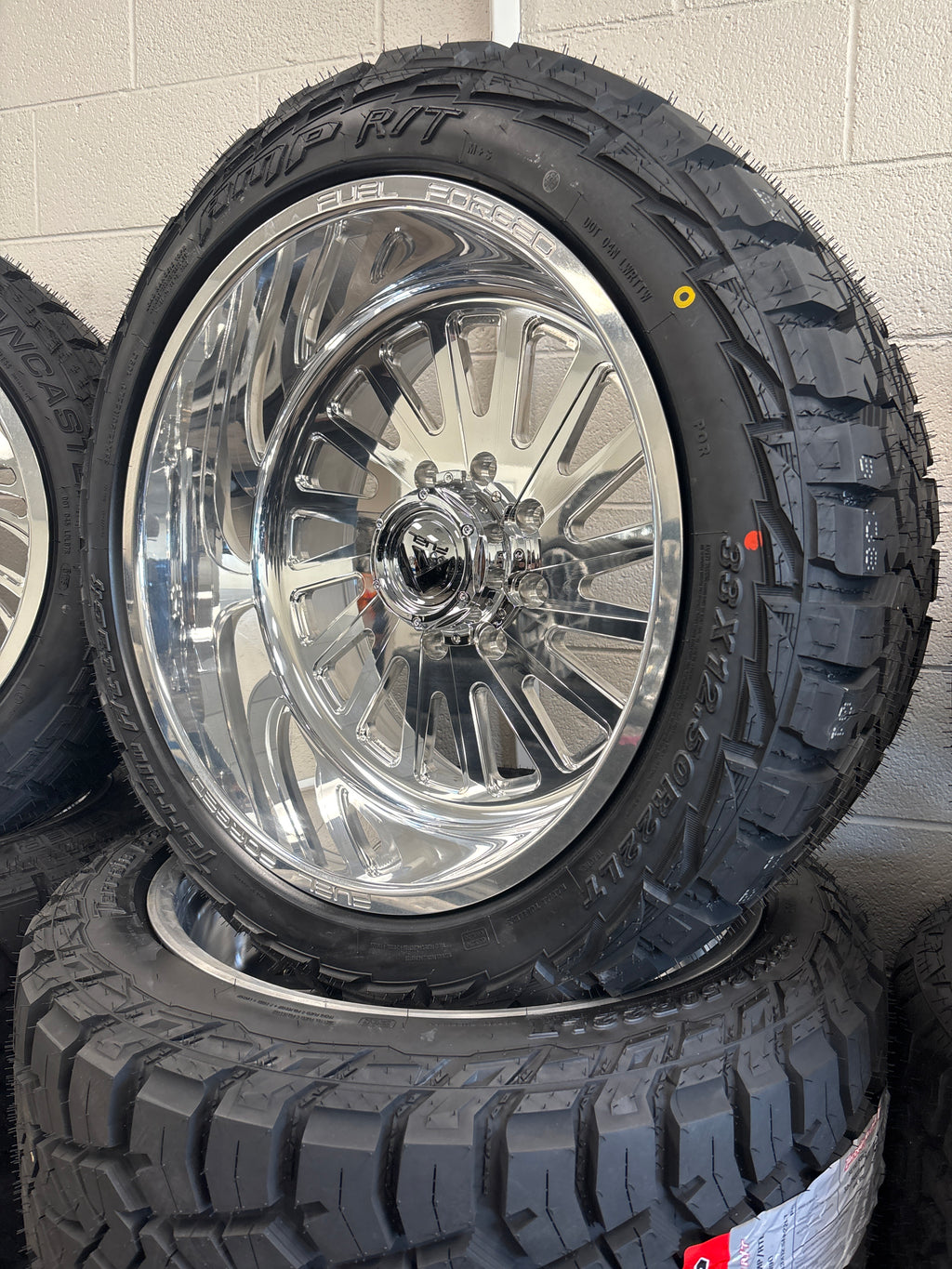 22x12 Fuel Forged FF016 Polished 8x180 & 33x12.50R22 AMP R/T