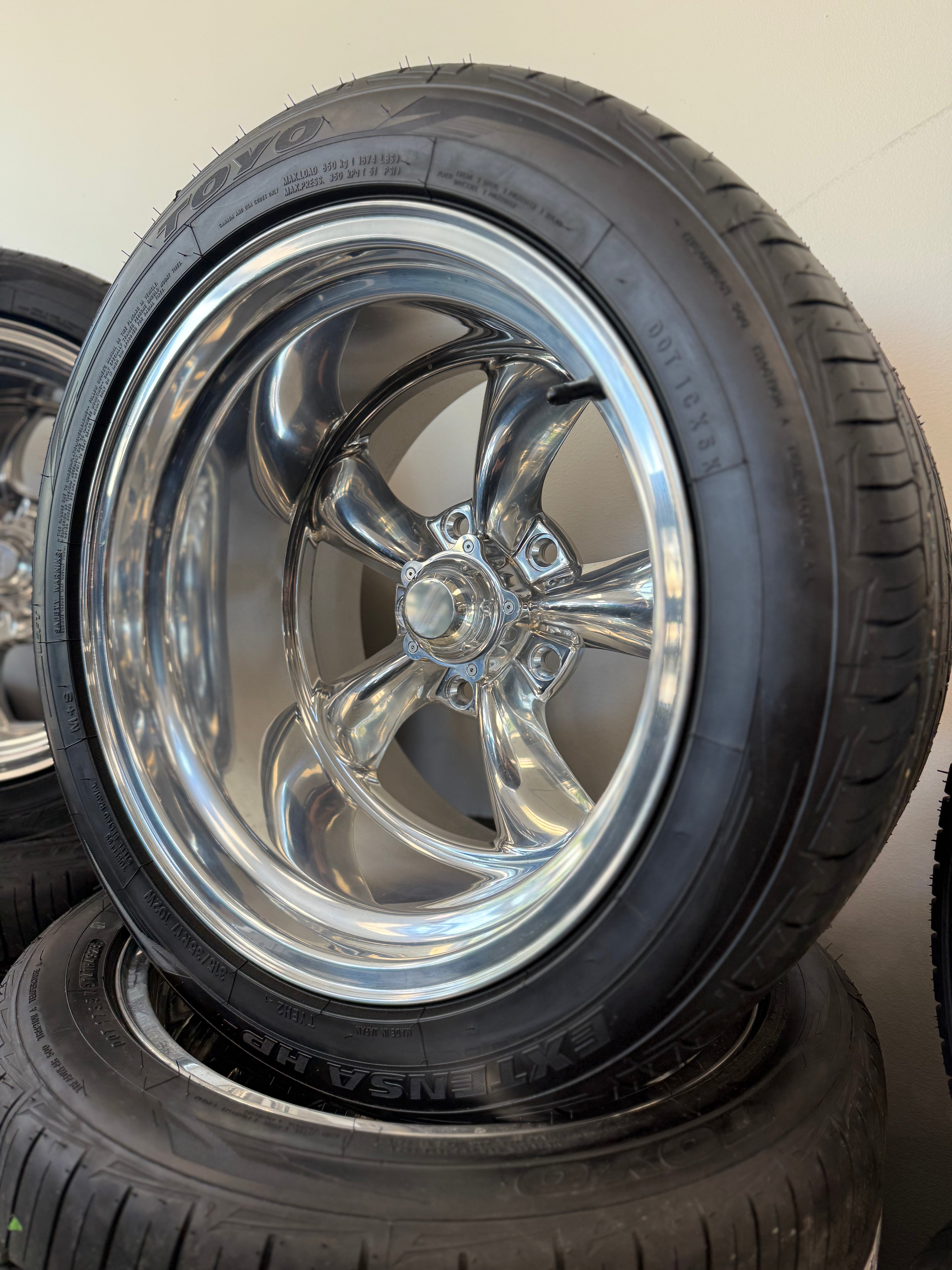 17x11 American Racing VN615 Torq 5x5.5 & 315/35R17 Toyo Extensa