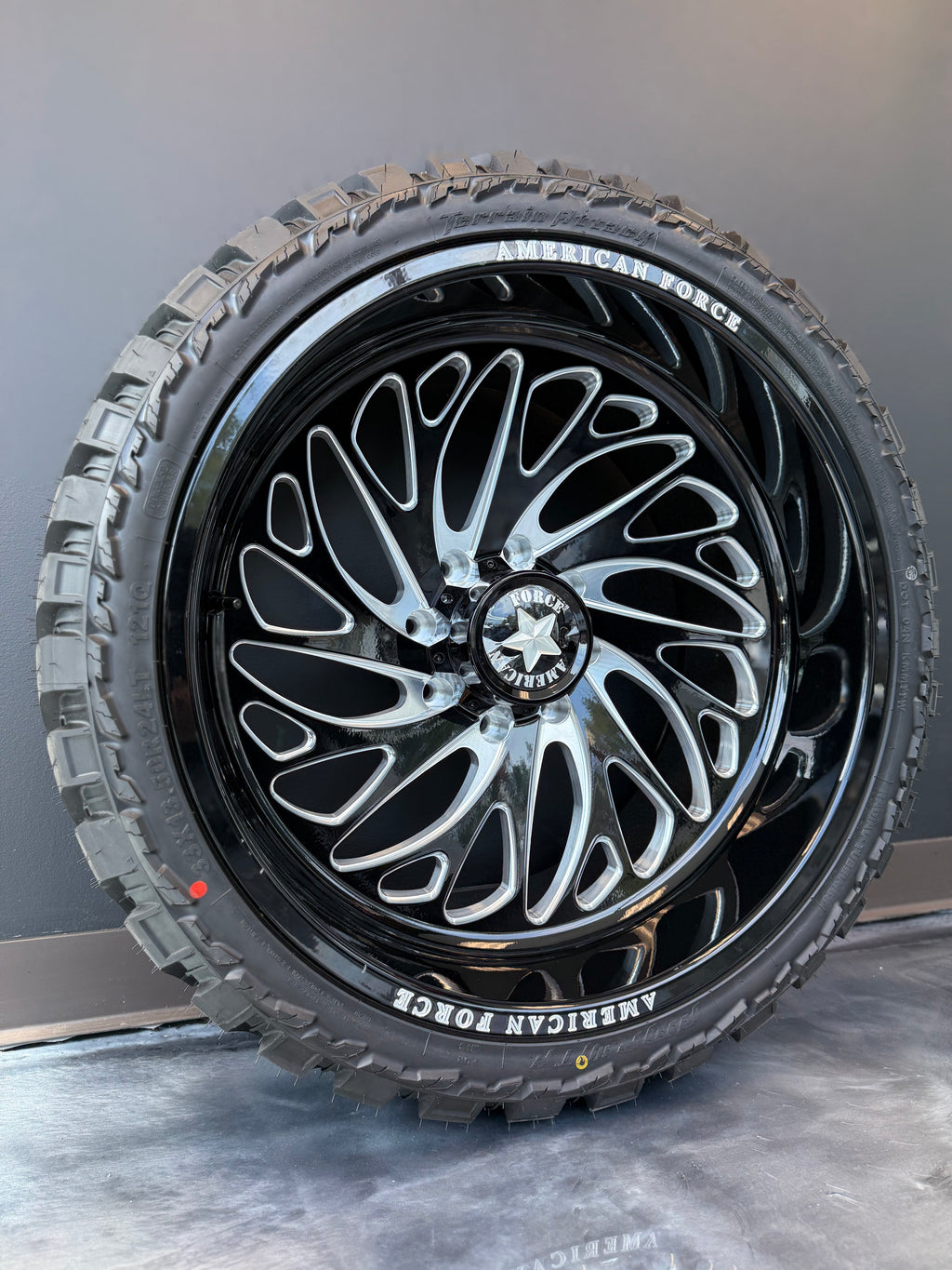 24x12 American Force Jolt 8x180 & 33x13.50R24 AMP MT