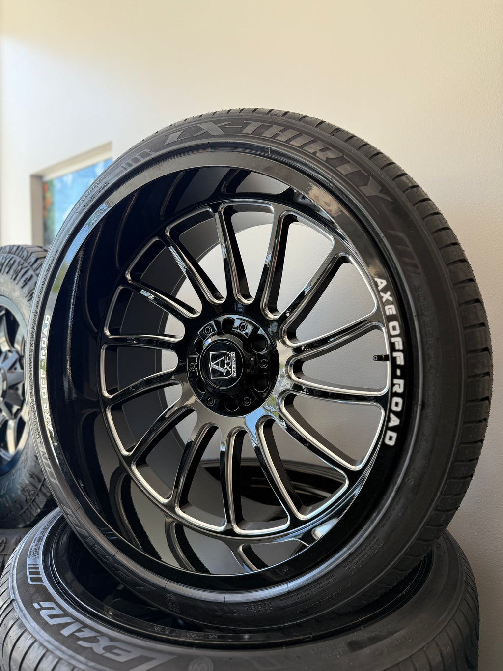 24x12 Axe Chronus GBM 6x5.5/ 6x135 & 305/35R24 Lexani