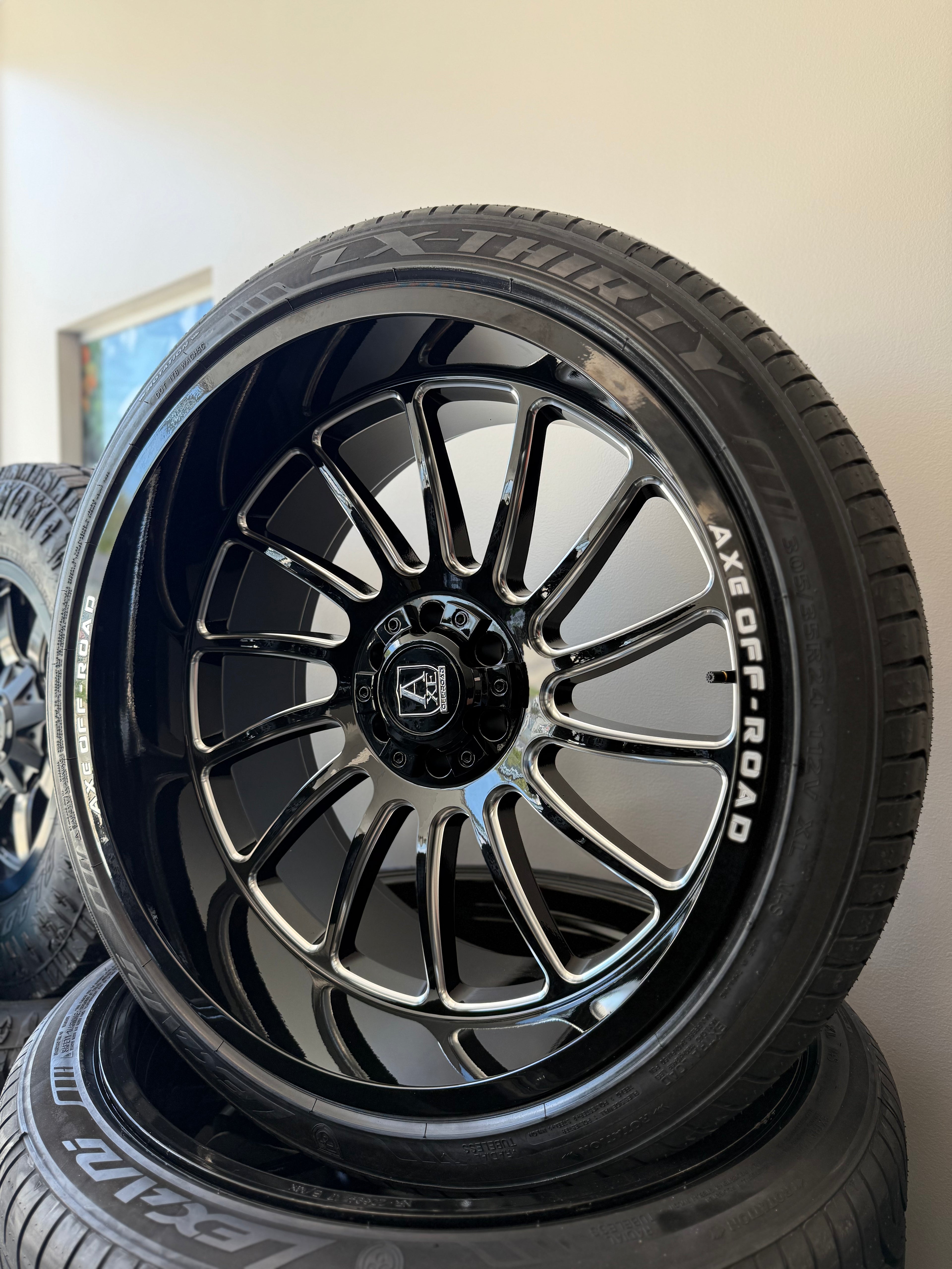 24x12 Axe Chronus GBM 6x5.5/ 6x135 & 305/35R24 Lexani