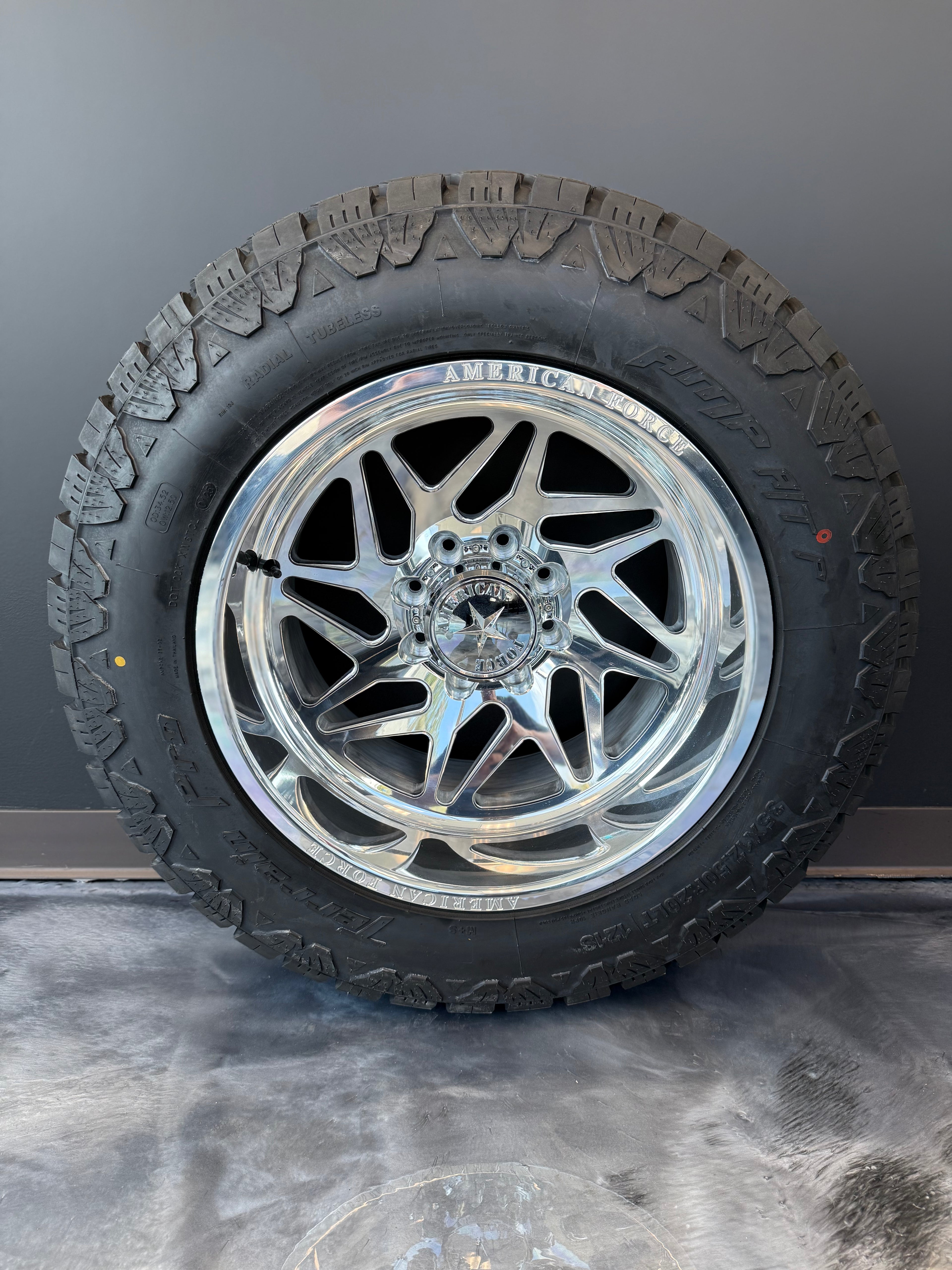 20x12 American Force Genesis CC 8x6.5 & 35x12.50R20 AMP AT PRO