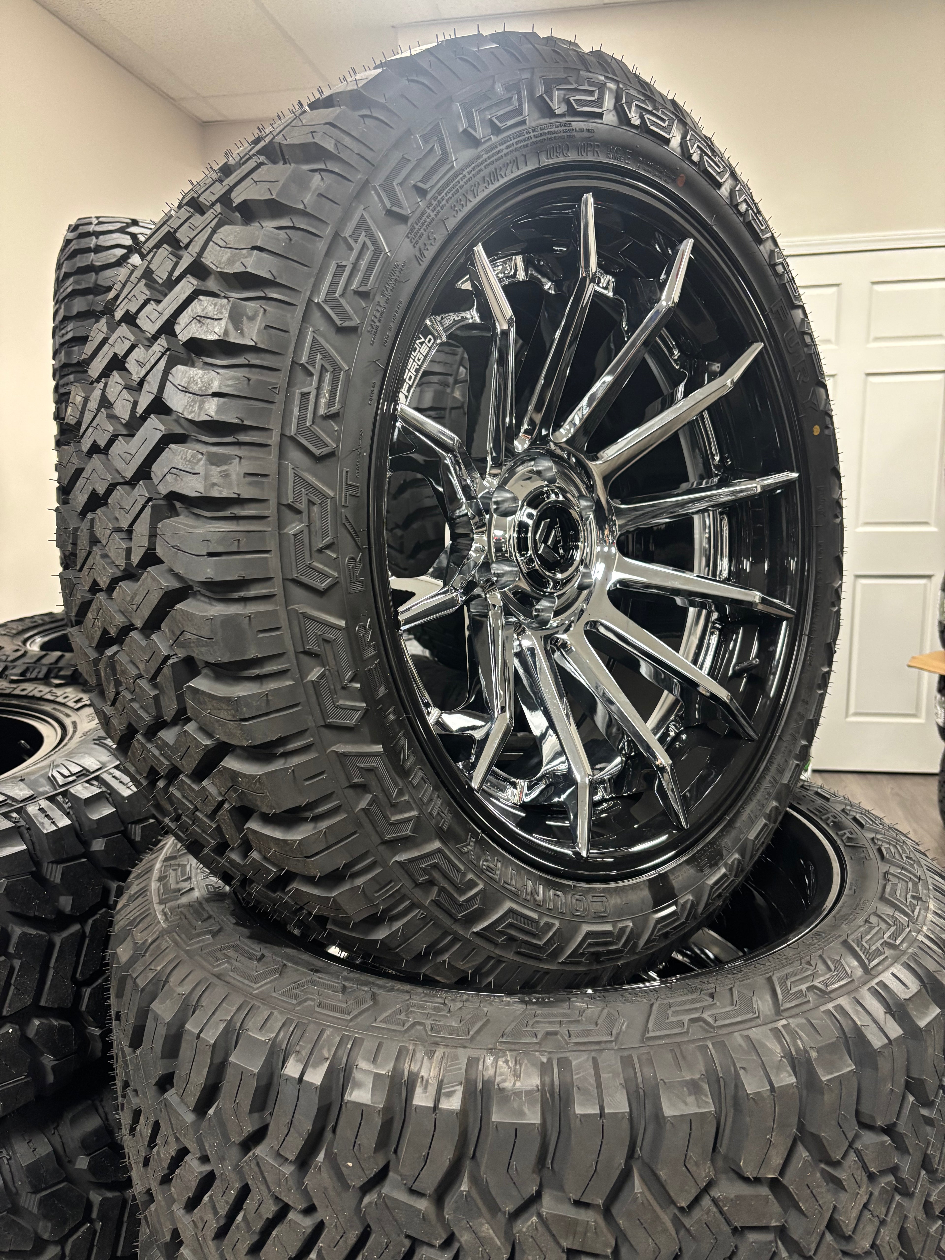 22x12 Fuel Burn FC403 Chrome G-Blk 6x135 & 33x12.50R22 Fury Country Hunter R/T