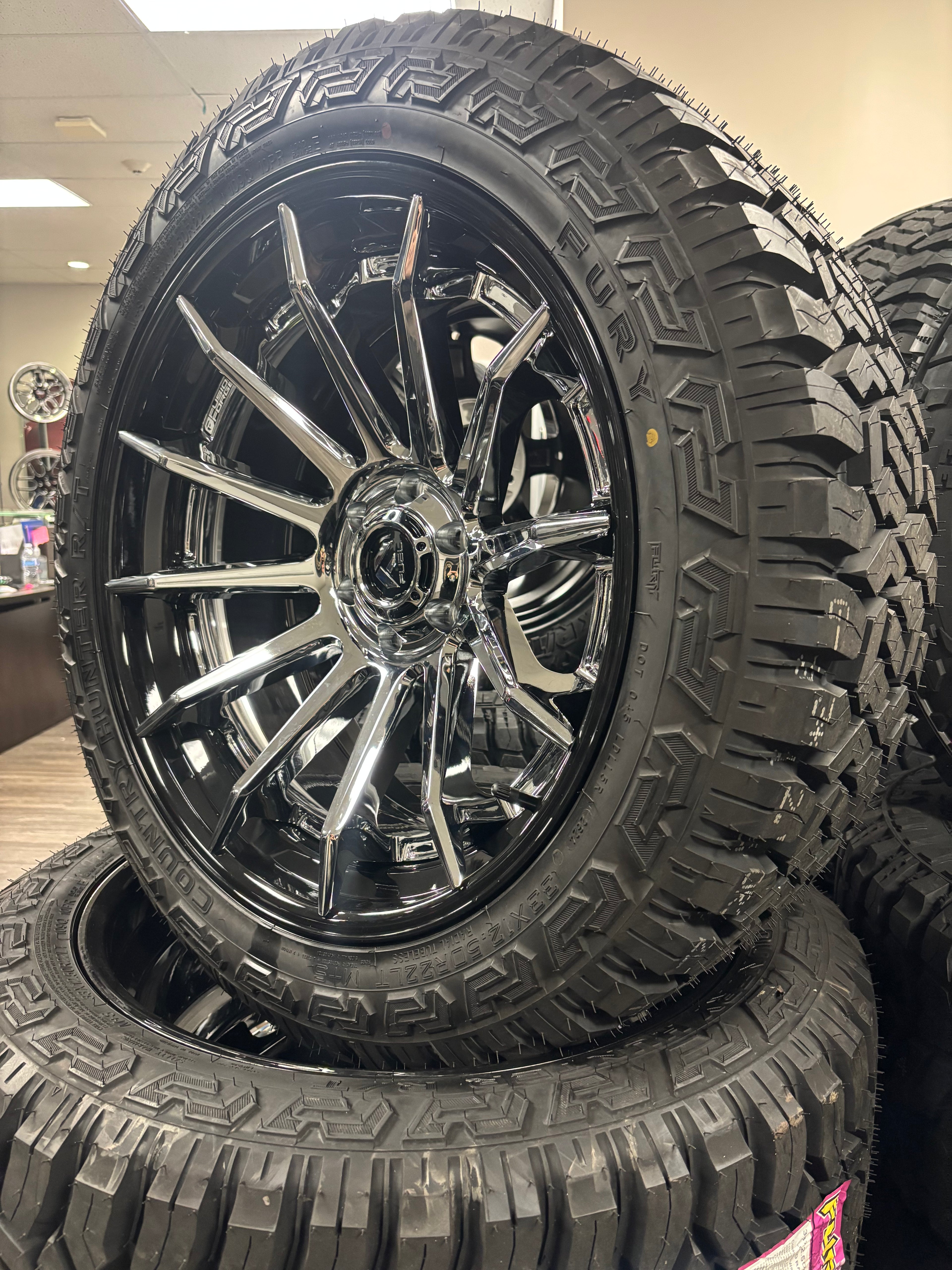 22x12 Fuel Burn FC403 Chrome G-Blk 6x135 & 33x12.50R22 Fury Country Hunter R/T