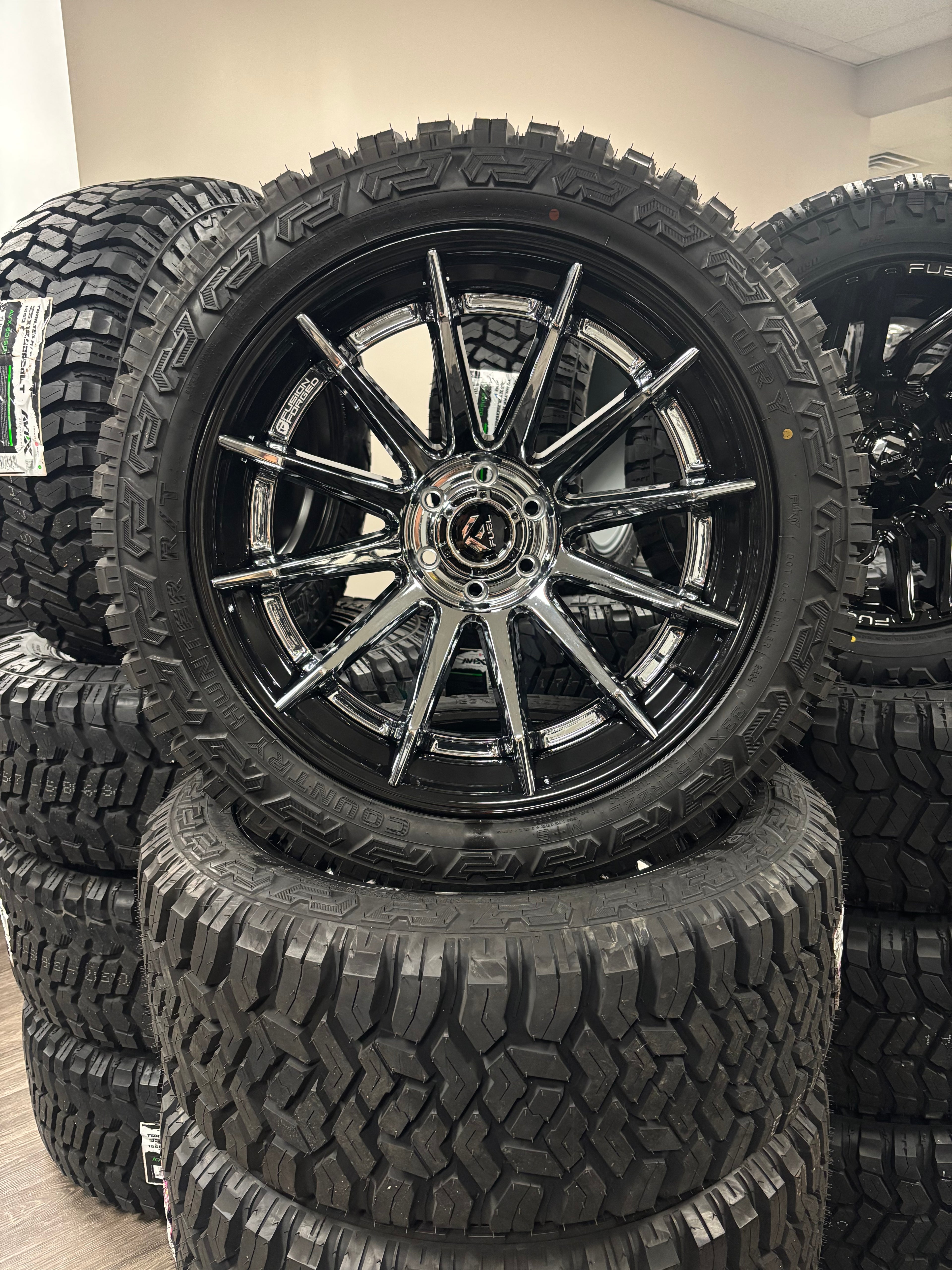 22x12 Fuel Burn FC403 Chrome G-Blk 6x135 & 33x12.50R22 Fury Country Hunter R/T